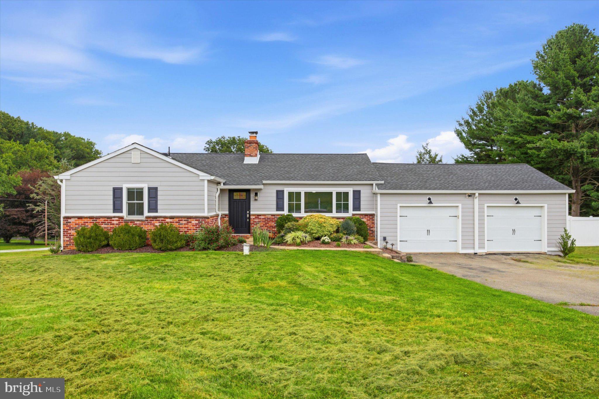 Welcome to this spacious ranch-style home situated on a full acre in desirable Downingtown. Located within the highly regarded Downingtown Area School District, this home offers four bedrooms, three full bathrooms, a finished walk-out lower level, and an incredible outdoor setting. With the ease of single-floor living and plenty of additional space to spread out, there’s so much to enjoy both inside and out.Inside, hardwood floors flow throughout the main level, where abundant natural light fills the spacious living room centered around a wood-burning fireplace. The bright kitchen features white cabinetry, stainless steel appliances, shiplap detailing, and plenty of counter space, opening to the adjoining dining area with sliding glass doors leading directly to the expansive rear deck. The main level features three bedrooms and two full bathrooms, including a primary bedroom with its own private bath, providing the convenience of comfortable single-floor living.The finished walk-out lower level adds an impressive amount of versatile living space, including a fourth bedroom, third full bathroom, office space, and a large recreation area perfect for movie nights, a playroom, home gym, or entertaining. The downstairs office and guest room were refinished in 2025, followed by the basement in August 2026. There's also plenty of storage throughout the home.Outdoor living is just as inviting, beginning with an expansive rear deck with steps leading down to the spacious, level backyard. The in-ground pool is a highlight during the warmer months, with plenty of surrounding yard space for entertaining, games, or simply enjoying the outdoors. A garden provides fresh produce throughout the season, while the farm across the street adds to the peaceful setting, offering beautiful seasonal views, colorful sunsets, and fireflies on summer evenings.A two-car attached garage provides additional parking and storage, while a second garage at the rear of the property offers even more flexibility. Conveniently located near grocery stores, parks, restaurants, everyday conveniences, and major routes including the Route 30 Bypass, this Downingtown home offers space, comfort, and an outdoor setting you'll look forward to enjoying year-round.
