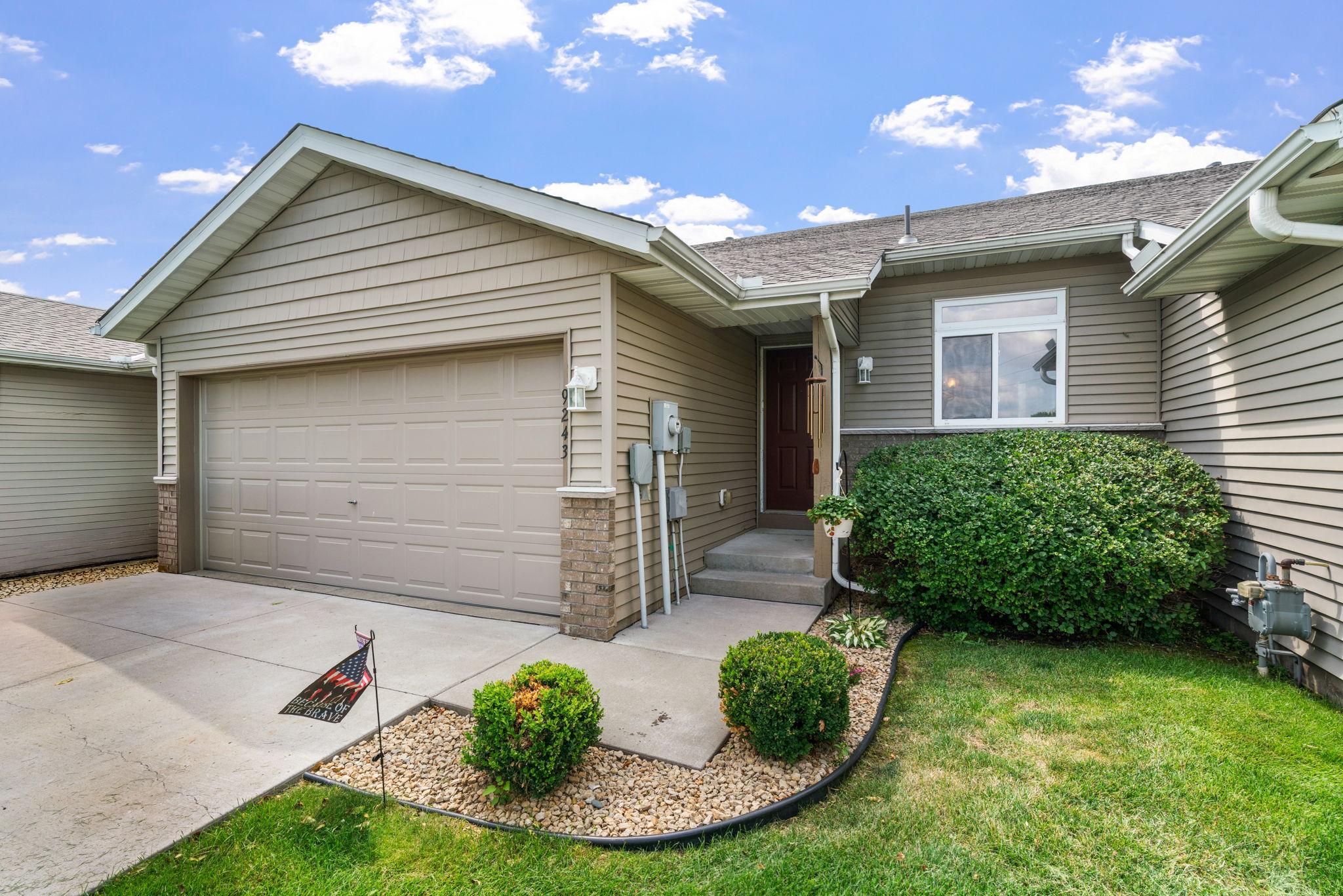 Welcome to this inviting 3-level townhome in Monticello, perfectly situated to enjoy peaceful pond views from the backyard. The bright, open layout features vaulted ceilings and LVP flooring, creating a spacious and welcoming feel. The kitchen offers plenty of storage with crisp white cabinetry, stainless steel appliances, a stylish backsplash, and a center island ideal for meal prep and casual seating. The walkout lower level provides additional living space and opens directly to a concrete patio where you can relax and take in the scenic pond views. Conveniently located with easy access to I-94 and just minutesfrom shopping, dining, parks, and everyday amenities. A wonderful combination of comfortable living, beautiful views, and a convenient Monticello location!
