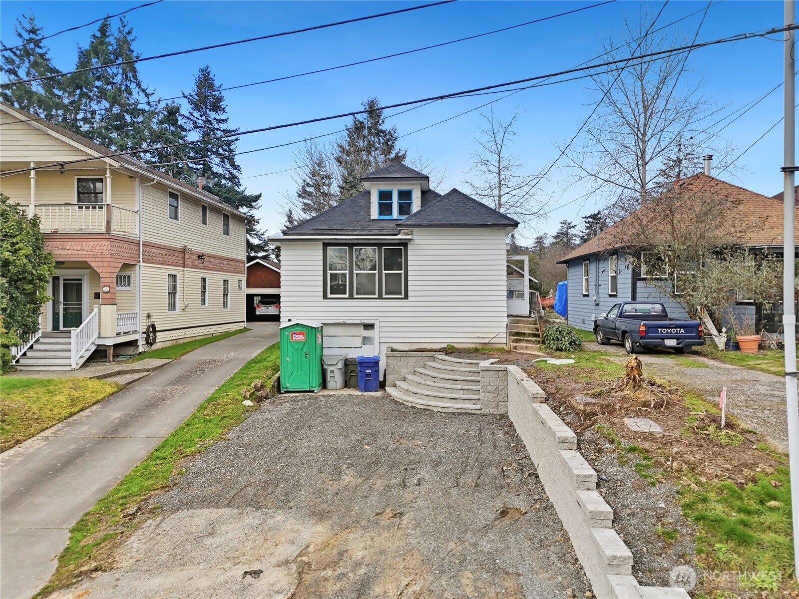 Investor’s dream with instant equity! This Renton property has had major upfront work already completed, including full demo, certified asbestos abatement, hardscaping, oil tank decommissioning and removal, a roof replaced in 2023 by the previous owners, several new windows, and a full house exterior paint. Included in the sale are professionally engineered and architect-designed plans to convert the home into a spacious 4 bedroom / 3 bathroom layout. Plans also feature a 1,200 sq ft ADU with potential for a DADU (buyer to verify), maximizing income or multigenerational living opportunities. The permit process is currently underway, allowing a buyer to move forward with a project already in motion.    Don’t miss this opportunity — capture instant equity and unlock the full potential of this prime Renton property today!