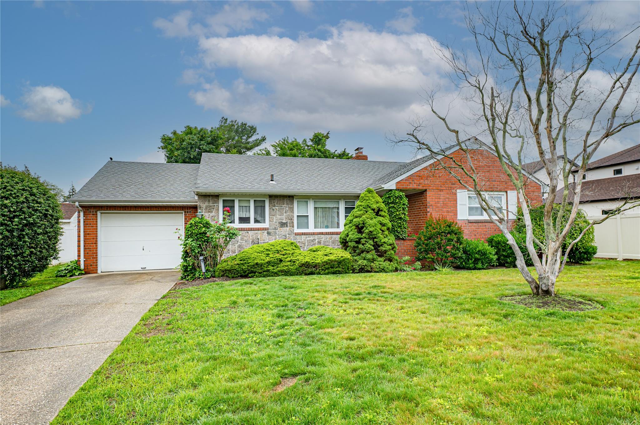 Charming Custom Ranch home located in Bethpage with Bethpage Schools. Home is mid block and sits on a 75x150 lot This Home features Kitchen, Dining. Living room, 2 large bedrooms. Bath and a full finished basement. The is a attached garage, beautiful backyard great for entertaining and BBQ's. Convenient located to all.
