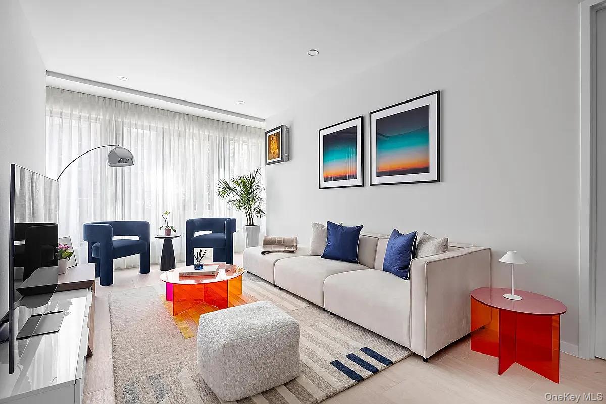 Exquisite 2-Bedroom, 2-Bathroom Residence at Arcadia Woodside Condominium$1,086 per ft²Discover elevated contemporary living in this beautifully appointed two-bedroom, two-bathroom residence at the prestigious Arcadia Woodside Condominium. Thoughtfully designed with exceptional craftsmanship and refined finishes throughout, this sophisticated home offers the perfect blend of elegance, comfort, and modern convenience.The residence showcases premium Porcelanosa tilework, sleek quartz countertops, and a chef-inspired kitchen equipped with state-of-the-art Bosch appliances. Integrated smart-home technology enhances everyday living, while the in-unit washer and dryer provide effortless convenience.Residents of Arcadia Woodside enjoy an unparalleled collection of luxury amenities, including a full-service doorman and concierge, an elegantly designed resident lounge, and a beautifully landscaped sundeck. The spectacular rooftop terrace offers sweeping skyline views and BBQ grilling stations, creating the ideal setting for entertaining or relaxing. Additional amenities include a state-of-the-art fitness center and an outdoor putting green for recreation and wellness.Perfectly positioned in the heart of Woodside, the condominium is located just one block from the LIRR, the 7 subway line, and multiple bus routes, including the Q18, Q32, Q53, and Q70 LaGuardia Link, providing seamless access to Manhattan, Long Island, and LaGuardia Airport.Experience a distinguished lifestyle defined by luxury, convenience, and exceptional connectivity at Arcadia Woodside Condominium.Please note: Listing photographs represent model residences and may not reflect the exact unit available for sale.