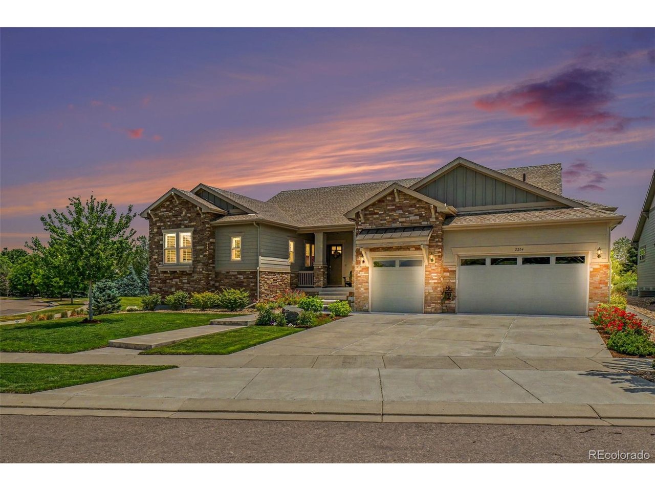 Set in sought-after Somerset Meadows, this beautifully finished ranch blends luxury, privacy, main-floor living and a setting that feels calm from the moment you arrive. The home has 4 bedrooms, each with a full en suite bathroom and generous walk in closets. With 5,600 finished sq. ft. and a 3-car garage with extra-deep bonus space, there is plenty of room to live, host and unwind.Inside, the main level feels bright and polished, with wide-slat plantation shutters, LVP flooring, high ceilings, 8' solid interior doors and a gas fireplace with stone surround. The kitchen is a true centerpiece, featuring marble counters, smart stainless appliances, double ovens, two Monogram dishwashers, a 48" refrigerator, large pantry, gas cooktop with pot filler and pendant lighting. The dining area adds a recessed ceiling and wet bar with filtered and instant hot water.The main-floor layout is hard to beat. The spacious primary suite offers wide-slat shutters, a recessed ceiling, 5-piece bath and a generous walk-in closet that connects directly to the laundry room. The laundry room adds cabinetry, counter space, a utility sink and access from both the primary suite and main living area.Downstairs, the finished basement is built for real enjoyment, with a large great room, custom built-ins, wet bar with bar fridge, dishwasher and filtered-water sink, game or exercise area, guest suite, workshop with sink and a double-glazed wine cellar with built-in shelving.Outside is where this home separates itself. A greenbelt along the north side, extra distance to the home behind, mountain views and nearby walking paths, ponds and green space create a private, park-like setting that feels tucked away. Add a covered deck, private yard and west-facing driveway that lets the sun help melt snow and ice, and this home is as practical as it is beautiful. It is also close to McIntosh Lake, Boulder, Niwot, downtown Longmont and Village at the Peaks. You will love it all!