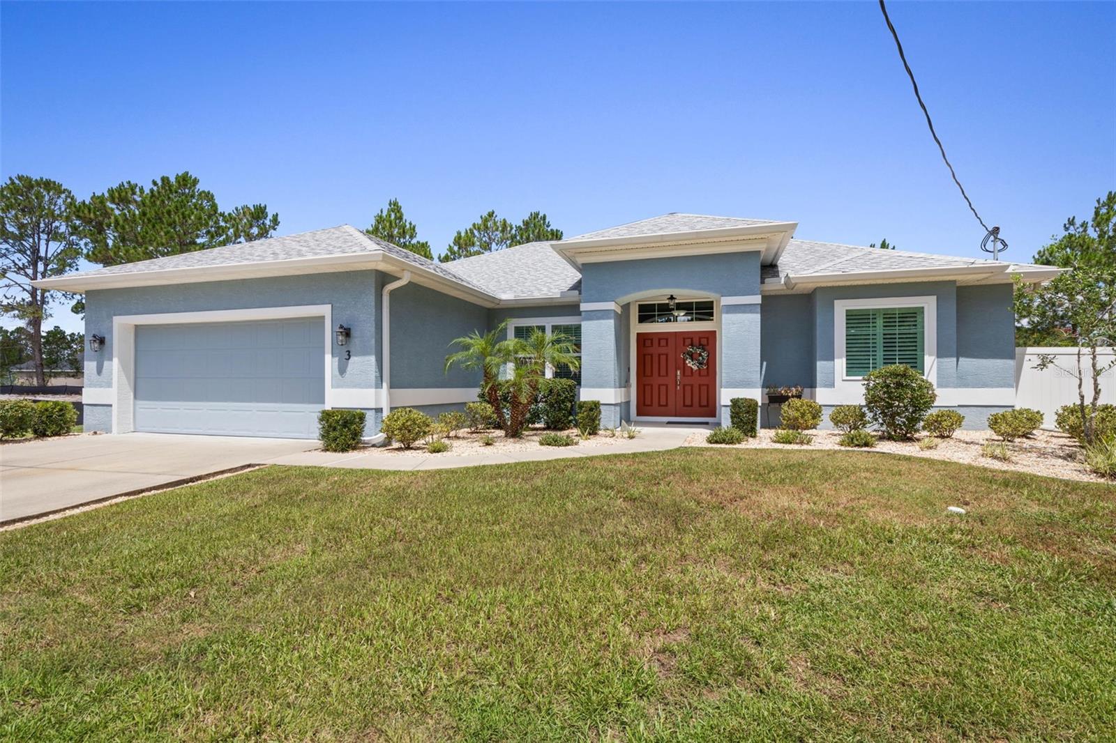 Under contract-accepting backup offers. BACK ON THE MARKET! NO FAULT OF THE SELLER INSPECTION AND APPRAISAL ON FILE! Welcome to 3 Leeds Place, a rare opportunity to own a meticulously built, Florida Green Building Coalition Platinum-certified home in the heart of Palm Coast. Constructed with insulated concrete form (ICF) exterior walls—rebar-reinforced and solid poured concrete—this home offers exceptional durability, energy efficiency, and peace of mind. Combined with hurricane impact windows, spray foam roof deck insulation, and advanced construction standards, this property is designed to withstand severe weather while delivering lower insurance costs and superior comfort.This 3-bedroom, 2-bath residence offers 1,622 square feet of living space and 2,501 total square feet under roof, including a fully air-conditioned garage with its own mini-split system. Inside, you'll find no carpet—only durable luxury vinyl plank and tile flooring throughout. The upgraded kitchen features solid wood cabinetry with pull-outs, solid surface countertops, a built-in cooktop, brand-new convection unit, wall oven/microwave combo, Bosch dishwasher, and a French door refrigerator with updated controls. A whole-house water softener and included washer and dryer add everyday convenience.The advanced HVAC system includes an Aprilaire fresh air unit with medical-grade filtration, enhancing indoor air quality. Step outside to enjoy the freshly painted lanai and pool deck, overlooking a well-maintained in-ground pool (chlorine, easily convertible to salt). The secondary bathroom offers a large walk-in shower with direct pool access—ideal for Florida living.Situated on approximately half an acre at the end of a quiet cul-de-sac, this property offers privacy and flexibility rarely found in Palm Coast. The adjacent vacant lot can serve as a natural buffer, be incorporated into the property, or even split and sold or developed for additional income potential. Surrounded by the former Matanzas Golf Course, the home enjoys serene green views and added seclusion. Additional features include perimeter gutters with guards, French drains for optimal drainage, and a smart Ring doorbell system.
