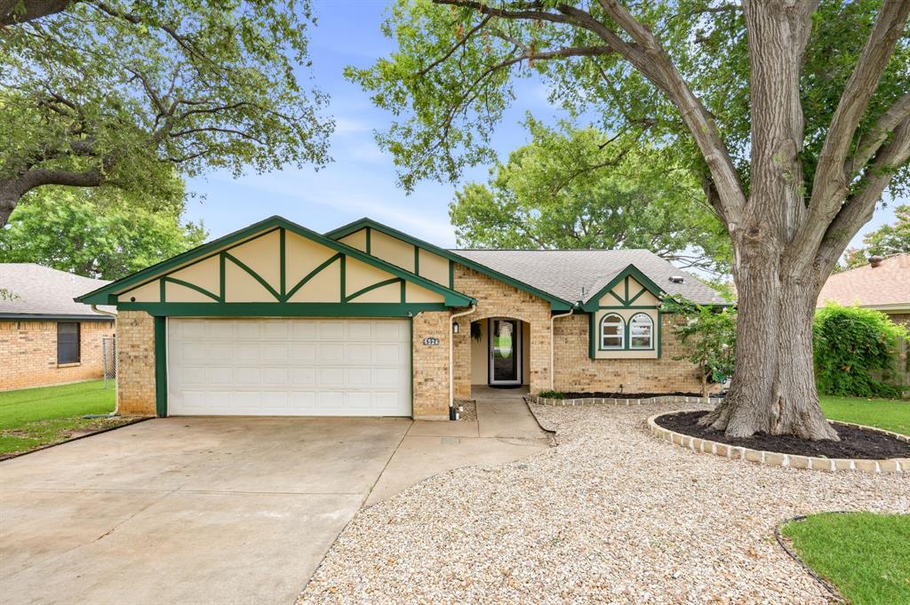 Welcome home to this beautifully maintained single story home in the heart of North Richland Hills! Featuring a desirable split bedroom 3 bedroom 2 bathroom floor plan. Recent updates provide peace of mind, including a brand-new roof (2026), new HVAC system (2025), laminate flooring (no carpet) and fresh interior paint throughout. The remodeled kitchen is the heart of the home, showcasing stainless steel appliances, abundant cabinetry, and seamless flow into the living and dining spaces. Natural light pours throughout the home creating bright and inviting spaces. A versatile wet bar adds character and flexibility, making it the perfect space for entertaining, a coffee bar, or additional serving area. Step outside to enjoy the spacious front and backyard, shaded by mature trees and complemented by lush St. Augustine grass. The outdoor shed conveys with the property, providing valuable storage space. Ideally located near shopping, dining, parks, and major highways, this move-in ready home combines thoughtful updates, flexible living spaces, and exceptional outdoor enjoyment.