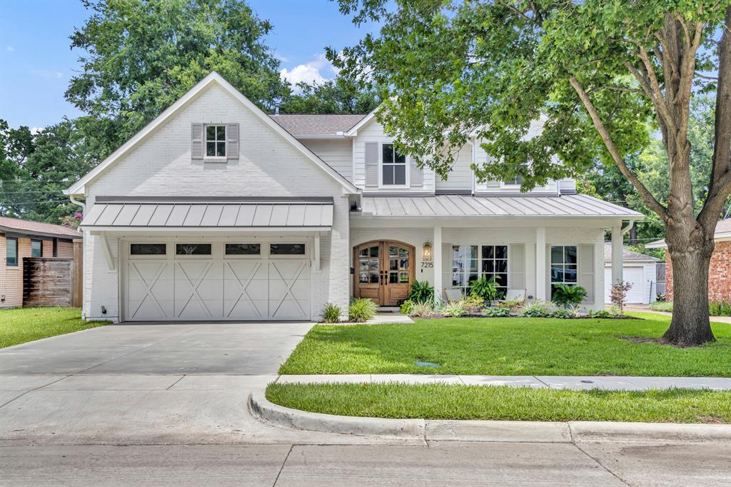 Built in 2022 and zoned to Lakewood Elementary, this elegant home blends thoughtful design with upscale comfort. The open-concept living area features a gas fireplace flanked by built-ins and seamlessly flows into the chef’s kitchen, complete with a built-in refrigerator and ice machine, a spacious island, and stainless steel appliances. A separate dining room with custom built-ins and a wine fridge offers the perfect setting for hosting. The luxurious primary suite includes a spa-inspired bath with dual sinks, soaking tub, and separate shower, along with a custom walk-in closet featuring washer and dryer hookups. A bonus room attached to the primary is ideal for a home gym or private retreat. Upstairs, you’ll find a generous family room, and the full-size utility room includes built-in cabinetry and a sink for added convenience. Outdoors, enjoy year-round entertaining in the expansive covered living area with a gas fireplace, outdoor kitchen, and wiring for automatic screens and security cameras. A spacious front porch, sprinkler system, wood fence, and attached two-car garage with EV plug complete the home’s thoughtful amenities. Every detail of this meticulously designed home offers a blend of luxury and livability, creating the perfect retreat near White Rock Lake.