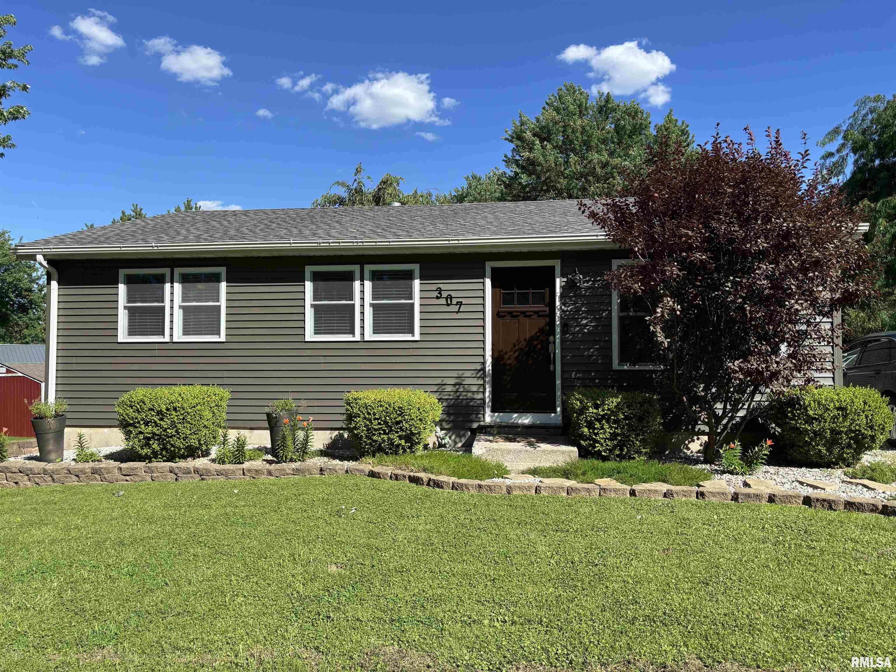 Charming 3 bedroom, 1 bath home with an eat-in kitchen connected to the beverage pantry.  Walk right out of the kitchen with your coffee to your large covered deck and watch the sun come up.  The finished basement has a large laundry room, family room, and rec room.  Feel the need to be outside?  This home sits on a great oversized corner lot giving you room for many outdoor activities.  Strawberries, raspberries and blueberries.  The storage shed is insulated and has electricity.  HVAC new in 2024