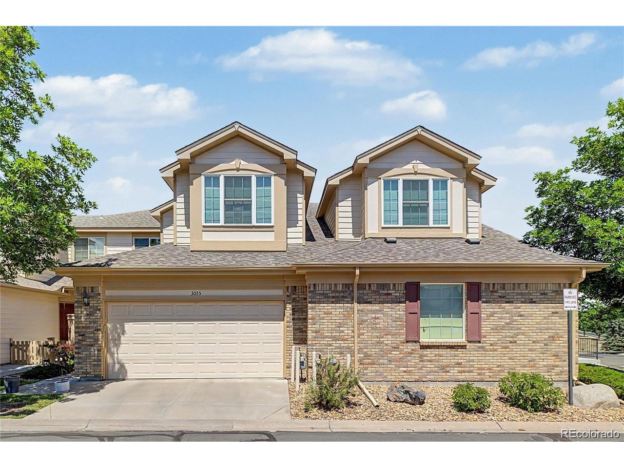 Located in the sought-after Tamarisk community of Lakewood, this beautifully maintained townhome offers an open floorplan, high ceilings, and stylish updates throughout. The main level features an inviting living room with a cozy fireplaceand an eat in kitchen with granite countertops, new stainless steel appliances, ample cabinetry, and a pantry. A convenienthalf bath and laundry room with a new washer and dryer complete the main floor. Upstairs, the spacious primary suiteincludes a newly remodeled five piece bathroom and a walk-in closet. This level also offers a second bedroom, anadditional full bathroom, and a versatile loft that is ideal for a home office, gym, reading nook, or flex space. The fullyfinished basement provides even more flexibility and can serve as a second primary suite, guest retreat, media room, oradditional living and entertainment area. Enjoy Colorado's outdoor lifestyle from the covered front porch or private backpatio. Additional features include a two car attached garage, nearby trails and parks, and access to community pools.Tamarisk offers a welcoming, connected neighborhood atmosphere with seasonal pool parties, barbecues, outdoor movienights, community picnics, holiday celebrations, and other resident events throughout the year. Conveniently located nearGreen Mountain, Red Rocks Park and Amphitheater, shopping, dining, outdoor recreation, and major highways, thisLakewood townhome combines comfort, convenience, and an active Colorado lifestyle.