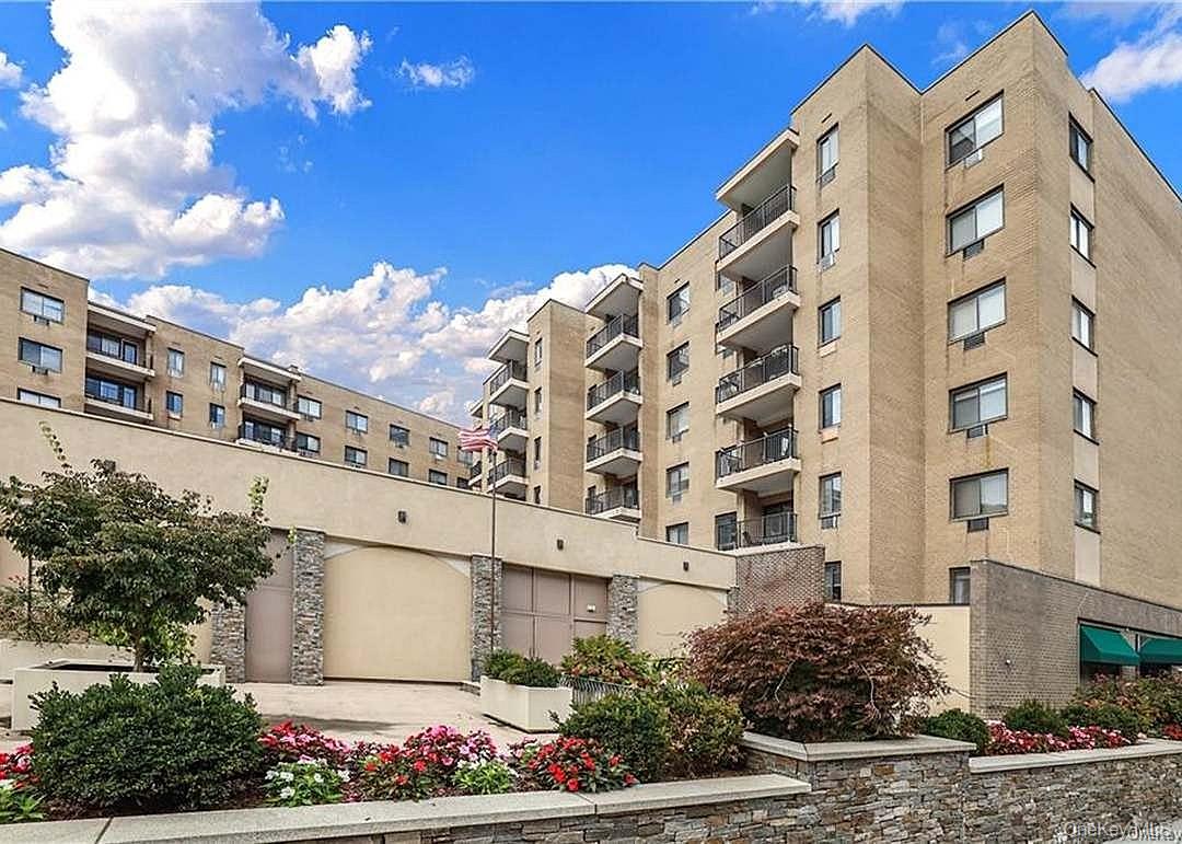 Sophisticated Hartsdale Living | 5-Minute Walk to Metro-North  -  Welcome to 100 East Hartsdale Avenue, a bright and spacious one-bedroom residence in a meticulously maintained mid-rise cooperative in the heart of Hartsdale. Ideally positioned for commuters, this well-appointed home combines comfortable living, storage, private balcony, and exceptional convenience.  The unit offers a renovated kitchen with stainless steel appliances, marble countertops and generous cabinetry. The spacious primary bedroom provides a comfortable retreat, while the balcony offers a private outdoor space.  Residents of 100 East enjoy a host of desirable amenities, including a lovely lobby, elevator, live-in superintendent, and a laundry facility conveniently located. Optional rental storage provides additional flexibility, while the included assigned indoor garage parking space adds everyday convenience. Residents also have exclusive access to the Town of Greenburgh's community amenities and parks. Location is a standout feature. The Hartsdale Metro-North Station is an easy, flat five-minute walk, with express service to Grand Central Terminal taking approximately 35–40 minutes. Just outside your door, discover Hartsdale's seasonal farmers' market, boutique shopping, restaurants, cafe's, and everyday conveniences. Easy access to the Bronx River Parkway provides convenient connections throughout Westchester.  A turnkey opportunity in a sought-after Hartsdale location, this residence offers the ideal combination of space, amenities, parking, outdoor living, and commuter convenience.