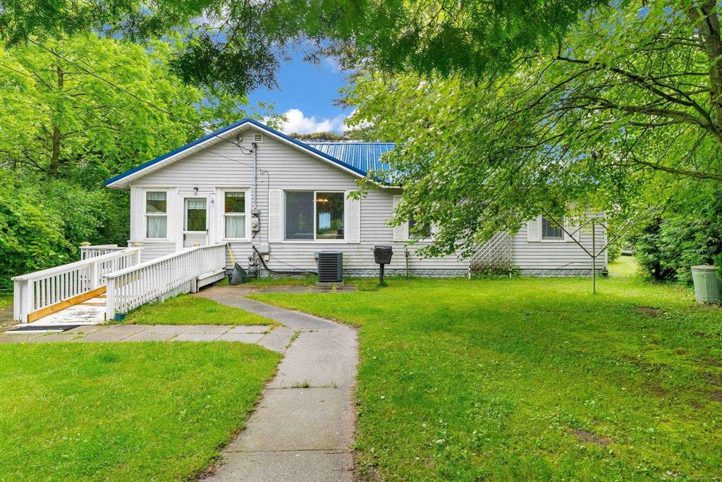 Wake up to the sound of the waves and stunning views with 50 feet of direct Lake Huron frontage. This 2-bedroom, 2-bath home offers the perfect blend of comfort and lakeside charm. Offering many amenities such as ; efficiant kitchen with appliances , a dining nook, spacious living room, large game room and above all a fully heated glassed in Lakeside room for your viewing pleasure!  There is a large 2 plus car garage with seperate living quarters and it's own bath & shower. Whether it's morning coffee or evenings by the shore, this is lakefront living at its best. Great for year-round use or a seasonal retreat.