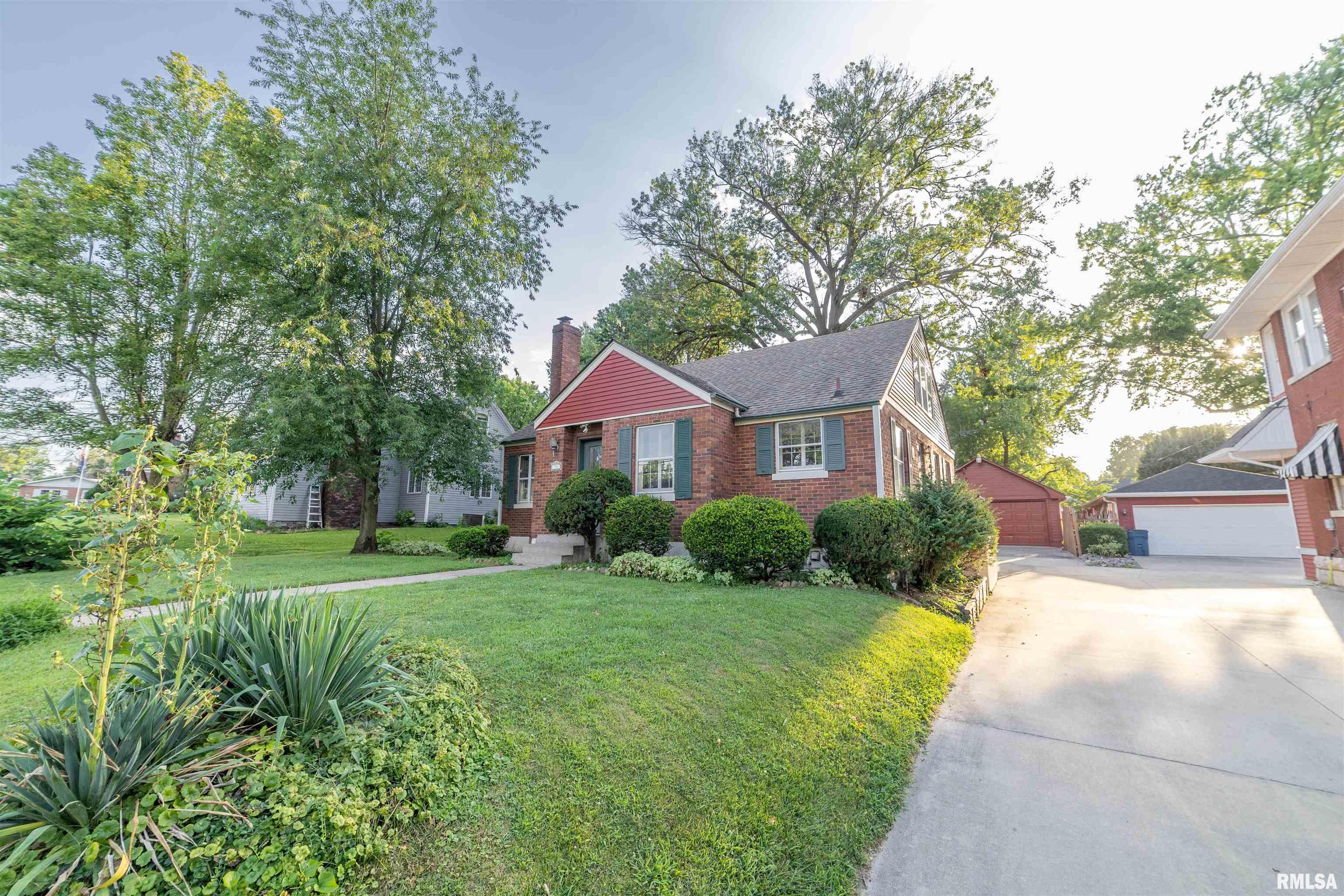 Lovingly maintained 3-bedroom, 2 full-bath brick cottage in a fantastic location near the local country club, with gold course view, and parks! This charming home offers beautiful hardwood floors, a cozy wood-burning fireplace, a spacious family room, and an abundance of storage throughout. Major updates within the last 10 years include the roof, siding, HVAC (2 systems), dishwasher, and refrigerator, providing peace of mind for the next owner. The finished basement features a large rec room plus an additional room that could serve as a home office or non-conforming 4th bedroom. Outside, you'll find a 2-car detached garage and additional lean-to for even more storage. Rich in local history, this home was once owned by Quincy founder John Wood. With its numerous updates, functional floor plan, finished basement, detached garage, and sought-after location, this is a wonderful opportunity for a new owner to make this well-loved home their own.