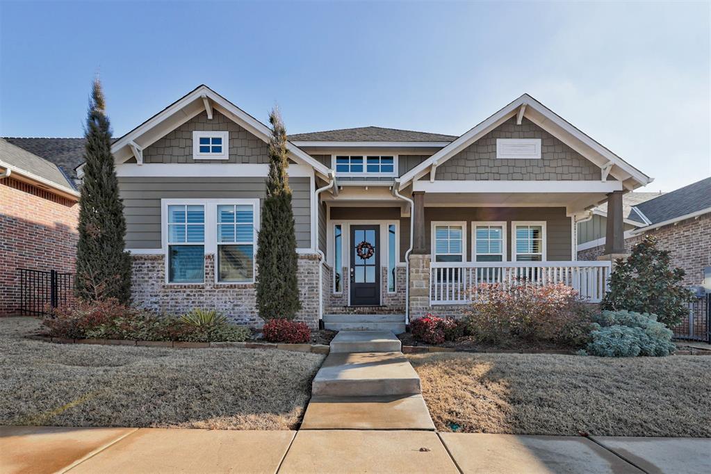 OPEN HOUSE SUNDAY, 01/04/26 FROM 2-4PM -- Some homes impress you, but this one will move you. -- 1748 Plaza District Dr is one of Town Square’s most inviting homes, where timeless design and natural light create a space that feels instantly comforting. From the charming exterior to the warm, airy interior, this home blends elevated finishes with everyday livability.Walking up, you’ll notice the Craftsman style front porch with classic details, leading you into a bright entryway. As you move through, the space opens into an airy layout that flows between the kitchen, dining, and living areas. The kitchen features quartz countertops, an expansive island, stainless steel appliances, and glass-front display cabinets with interior lighting. Adjacent to the kitchen is a large built-in with glass-front uppers and generous lower storage, perfect for serving pieces, styling, or everyday essentials. The dining area comfortably connects the kitchen and living room, keeping the transition seamless. The living area opens with 16ft ceilings, warm wood beams, a stacked-stone fireplace, and built-in cabinetry. Large sliding glass doors draw in beautiful morning light that fills the home and look onto the backyard. The screened-in patio includes a TV mount and gas line for grilling, with evergreen trees adding privacy and a peaceful backdrop. The primary suite offers a quiet retreat with a spa-like en suite featuring a soaking tub, walk-in shower, dual vanities, and a walk-through closet connecting to the laundry room. Two additional bedrooms, a guest bath, a dedicated office, and a built-in mudroom complete the layout. Town Square offers community-centered lifestyle w/ a resort-style pool, fitness center, rec center, playground, walking trails, community garden, fishing pond, and events. Just houses from the Residents Club and close to I-35, shops, restaurants, and more. Schedule your showing today!