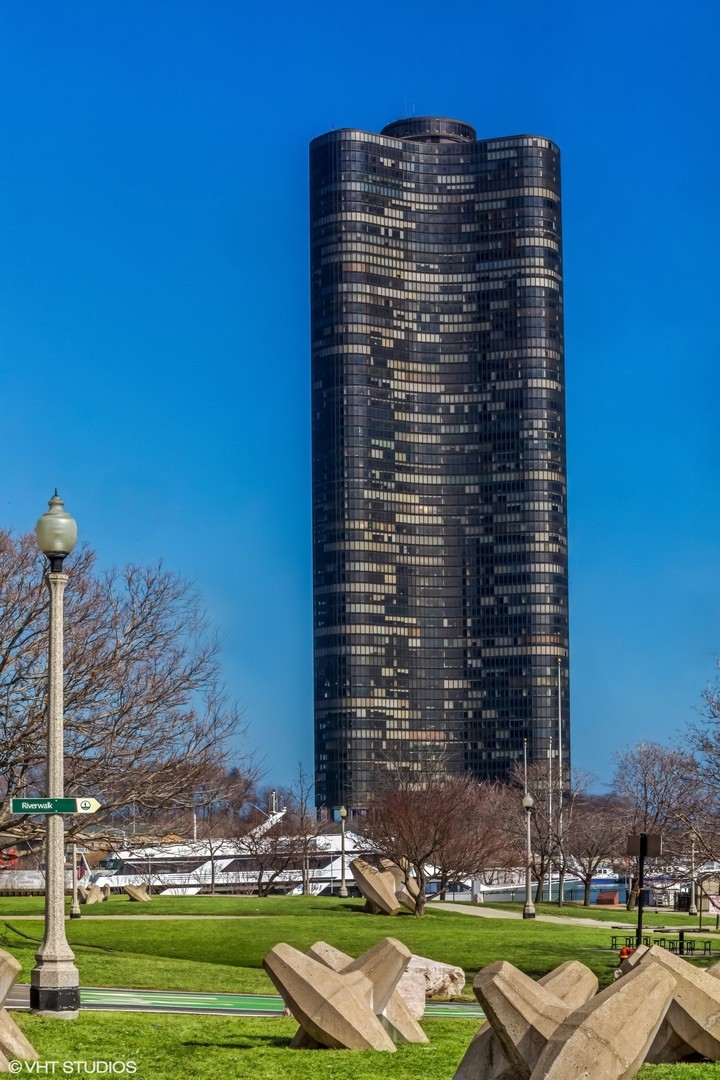 4th of July Special! See Chicago in a New Light this Lux Combined unit with 1850 sq ft this 21st Floor Pet Friendly unit Facing Navy Pier, Lake Michigan with Floor to Ceiling Windows to see both East and South Views! Catch and all the Summer Festivities including the Air Show.  This unit features ALL NEW Luxury Vinyl Flooring throughout. In Unit Laundry, Dining room with Expanded Living Area of 1850 sq ft. Custom Kitchen with upgraded appliances. This original 3 bed 2 bath unit has been opened up to the Living room for awesome views south but can be walled back for the 3rd bedroom if needed.  With Spectacular views Of Navy Pier Ferris Wheel and the Lake and the Sun Drenched South and East Views. Pets OK 1 DOG OR CAT ALLOWED additional deposit required.This Luxury Unit Includes a  Marble foyer,Granite counters, Custom kitchen w/ Cherry Cabinets, Stainless Steel Appliances, Custom Baths, Huge Master Suite, 2nd bedroom with a built in Murphy Bed. Definitely a Must See..This Premiere building with every amenity- Private Park, Tennis, Restaurant, Health Club, Outdoor and Indoor Pool, 24 hour doorman, Rental Parking Available Monthly thru Building Parking Garage..Jumbo rates as Low as 6.25 available for this unit call us today for more info.