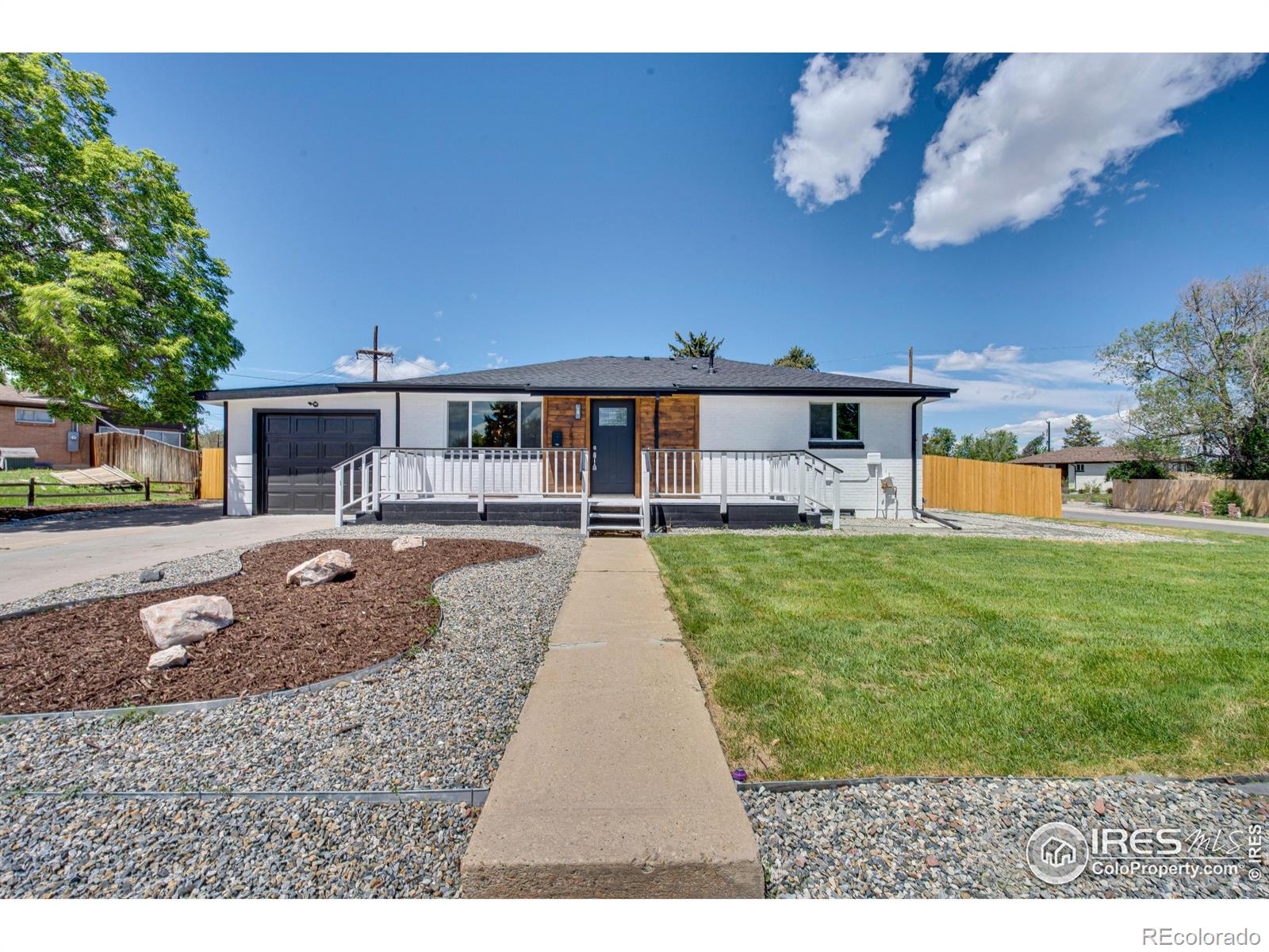 Welcome to this beautifully renovated five-bedroom, three-bathroom home located in the desirable Sherwood Estates neighborhood of unincorporated Adams County. Perfectly positioned on a spacious corner lot, this property offers both privacy and convenience, with easy access to major highways. Every detail has been thoughtfully redone with full permits, including a brand-new roof, new interior and exterior paint, updated plumbing and electrical, and brand-new HVAC systems, including a high-efficiency tankless water heater.Step inside to discover stunning hardwood floors, modern wood accents, and an open-concept layout that flows effortlessly. The kitchen features crisp white shaker cabinets, gleaming quartz countertops, and stainless steel appliances. There is a master suite for your privacy and relaxation. Outside, enjoy the newly installed sprinkler system, fresh landscaping, and plenty of room to entertain or unwind.This move-in-ready home is a rare find in a quiet, established neighborhood with no HOA. Don't miss your chance to own a fully upgraded home in one of Adams County's most sought-after communities.