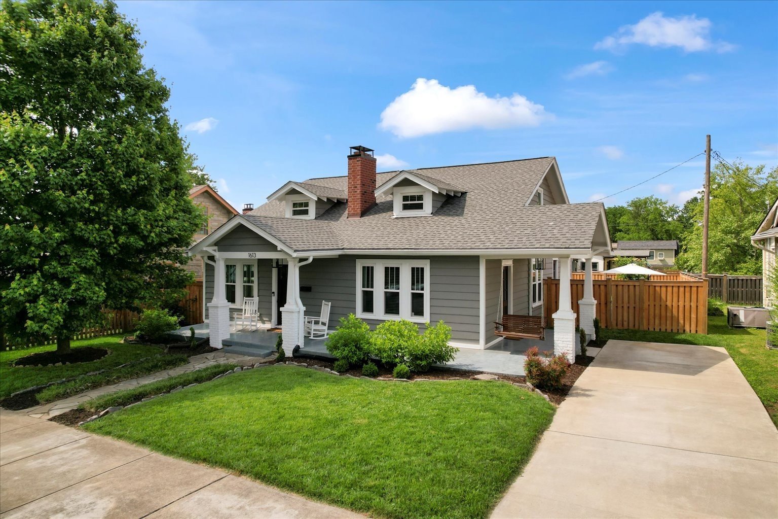 Welcome to your dream home in one of East Nashville’s most sought-after neighborhoods—Lockeland Springs. Nestled on a tree-lined street and fully renovated to the studs, this 1920s classic blends timeless character with modern luxury, offering the best of both worlds. Inside you’ll find a flexible and spacious layout with two primary suite options—upstairs or on the main level—perfect for accommodating guests, multi-generational living, or even short-term rental income. The first-floor ensuite bedroom is ideal for in-laws, a nanny suite, or private office. Thoughtful, high-end finishes include rich hardwood floors, a bright and elegant kitchen with stone counters and stainless appliances, and beautifully updated bathrooms in a clean, neutral palette. The home is bathed in natural light and boasts a warm, inviting energy throughout. Step outside and enjoy three distinct outdoor living spaces: sip your morning coffee on the covered front porch, entertain guests on the back deck or patio, or unwind in the fully fenced backyard—perfect for kids, pets, or a quiet escape. Located in the Lockeland Elementary Priority Zone, you're just a short stroll or bike ride from the best of 37206—iconic neighborhood spots like Lockeland Table, Rosepepper Cantina, Urban Cowboy, Shelby Park, and the Five Points district. Enjoy walkability, community, and the unique vibe that makes Lockeland Springs one of Nashville’s most beloved places to call home. This one checks all the boxes—style, space, location, and lifestyle. Don't miss your chance to own a piece of East Nashville magic.
