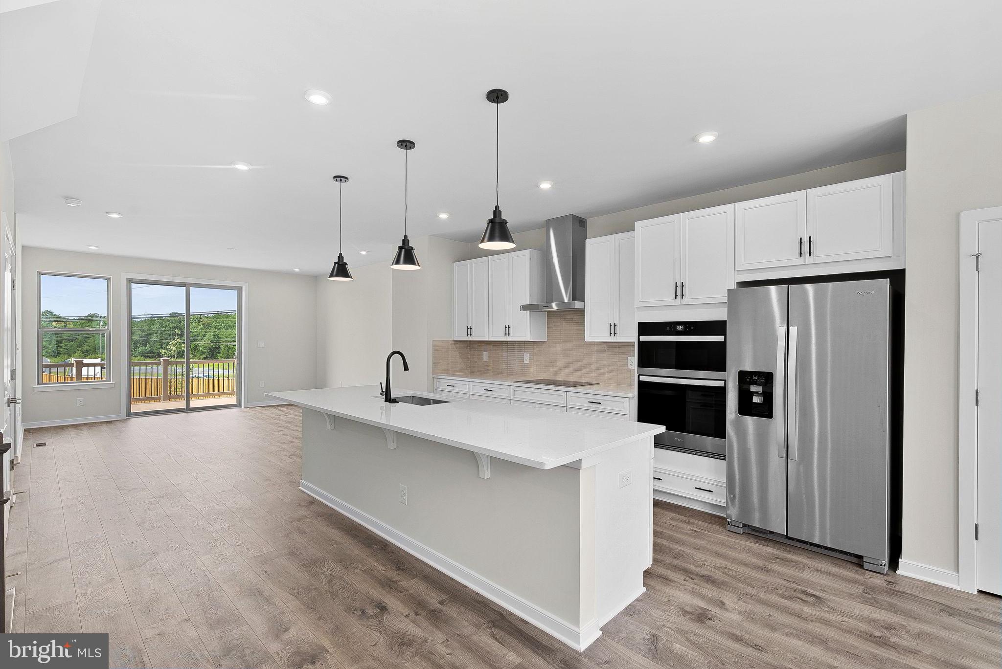 NEW CONSTRUCTION. Special all-in price, ready for immediate move in! Get up to $25K in closing costs when using a Choice Lender until 8/31. See New Home Counselor for Details. Introducing the Harding, a stunning 3-level luxury townhome with a 2-car garage in the sought-after Belmont Park community in Ashburn, VA. This interior unit spacious townhome offers 4 bedrooms and 3.5 baths, designed for comfort and style with 9 ft. ceilings throughout. The gourmet kitchen is a showstopper, featuring painted linen shaker-style cabinets with hardware, pendant lighting, quartz countertops, tile backsplash, pantry, range hood, microwave/wall oven, and stainless-steel Whirlpool appliances. Designer laminate flooring flows through the foyer, kitchen, dining room, great room, and office for a sleek, cohesive look. Upstairs, the luxurious primary suite includes a generous walk-in closet and a spa-inspired bathroom with raised double vanities, quartz countertops, and a ceramic tile shower with seat. A deck is off the main level to extend gatherings and relaxation. Plus, the EV charger-compatible outlet in your garage makes this home future-ready. Enjoy low-maintenance living with snow removal, lawn care, and exterior upkeep all handled for you—giving you more time to enjoy life. Belmont Park offers resort-style amenities including bocce ball, volleyball, playgrounds, and community greenspace. Located in Ashburn, you’ll have quick access to major roadways, Dulles Airport, and endless dining and entertainment options like Cooper’s Hawk Winery and TopGolf. Beazer Homes at Belmont Park are designed to live better day to day, with energy efficient construction that lowers monthly utility costs, thoughtful design options that make personalization simple, and Mortgage Choice, where our top lenders help you compare options and save money on your home loan. This high- performance home is built to lower your total cost of homeownership through reduced utility bills, durable materials, and high-quality construction that minimizes long-term maintenance costs. Beazer Homes is proud to be America’s #1 Energy Efficient homebuilder. Our FY25 average gross HERS score of 32 (38 excluding solar) was the lowest of the publicly reported scores among the top 30 U.S. homebuilders by volume identified by Builder Magazine’s Top 100 List (based on 2025 total closings). Get protection against rising energy costs without changing how you live. Every Beazer home is pre-wired for solar, making it easier and more affordable to add a renewable system when you are ready. Photos of similar home. Model Home Hours: Mon–Sun, 11 AM–6 PM. Use 19774 Sepia Square Ashburn, VA 20147 for GPS directions. Please go to the information center listed here first.