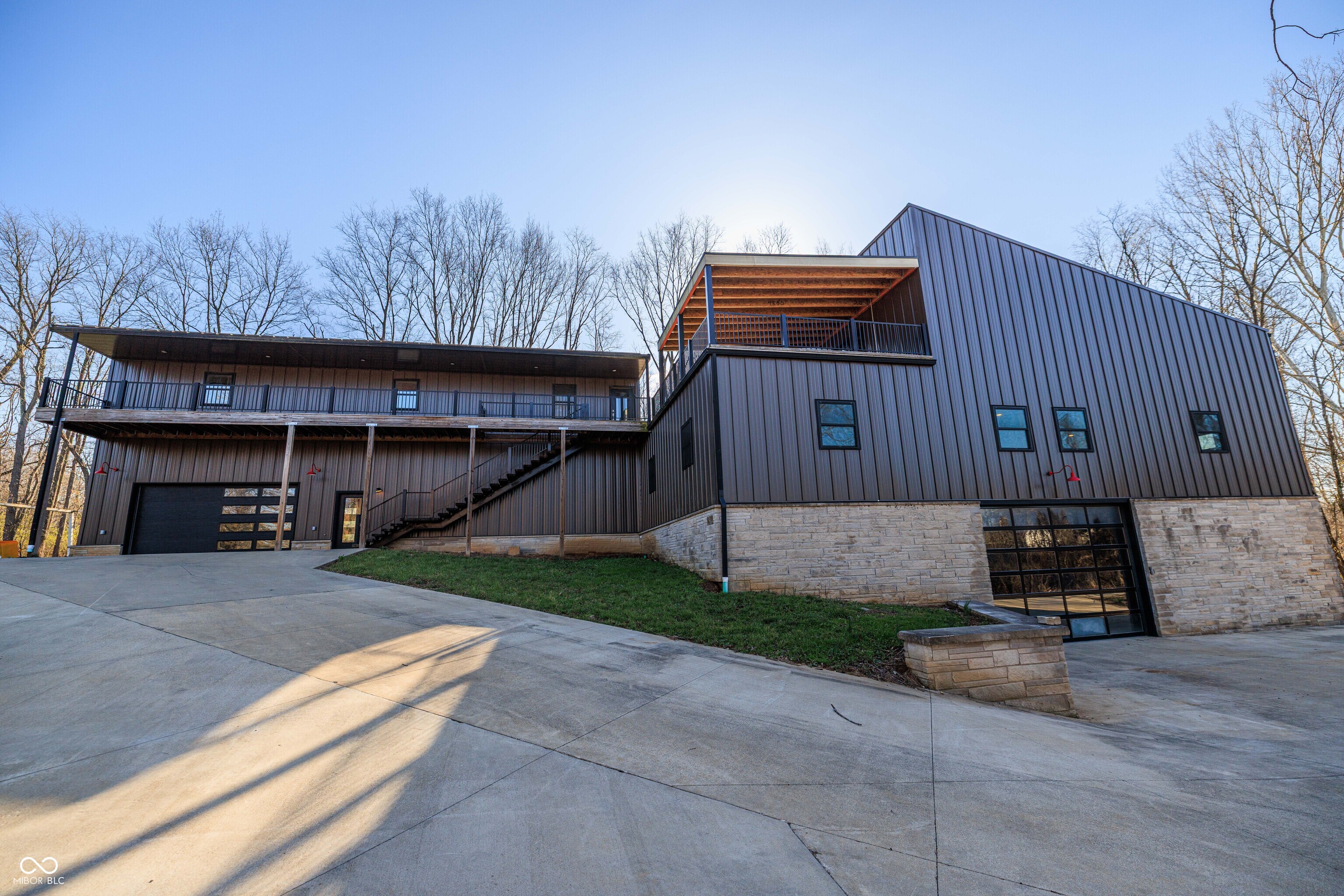 ***PROPERTY IS SELLING AT AUCTION SO THE "LIST PRICE" IS JUST A PLACE HOLDER FOR INTERNET FILTERING*** This tract features a modern commercial warehouse building constructed in 2018, offering approximately 6,800+ square feet of usable space including warehouse and office areas . The building is well-suited for a variety of uses including contracting business, storage, light industrial, distribution, or investment purposes. Highlights: ~6,840 sq ft total building Warehouse space + finished office area High ceilings and functional layout. Concrete parking and access areas.  NOTE:  Current zoning is Residential 1 on this property per county planning information.  Excellent location for business operations Ideal for: - Contractors / trades - Small business owners - Equipment storage - Investment / rental income -This tract is a  standout feature of the auction and creates strong live/work potential when combined with the residential tracts.