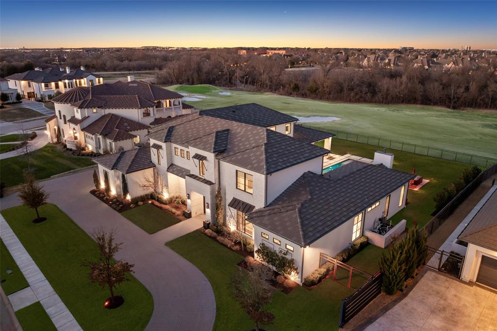 An incredible opportunity to own in the prestigious guard gated community of Wimberly Place, the only gated luxury community in Allen. A true custom offering with unique privacy and top-of-the-line construction throughout on a premier Twin Creeks golf course lot. This newer construction estate maximizes its footprint while leaving plenty of grass for entertaining and outdoor enjoyment. The home reflects today’s most desirable design trends and timeless appeal, blending transitional and modern accents. Enter through tall French iron doors into a light-filled interior where floor-to-ceiling glass showcases the resort-style pool and outdoor living areas, perfect for rest and relaxation. Chalky white museum-smooth walls and wide-plank white oak floors create a gallery-like backdrop for art and beautiful everyday living. The open kitchen, breakfast area, and family room connect seamlessly with a large walk-in bar, theater, and butler’s pantry- ideal for hosting or quiet nights in. The oversized primary suite offers a private retreat with spa-like ensuite bath and enormous closet, while a separate junior primary in-law suite sits on the opposite wing for privacy. Upstairs, a spacious lounge and game area connect to three well-appointed ensuite bedrooms, a secondary laundry room, creating an ideal layout for modern living. Built with extraordinary attention to detail and structural integrity by the sellers, including over 100 piers, foam insulation, concrete tile roof, imported stone flooring, select white oak floors, level 4 countertops, Wolf-SubZero appliances, built-in Miele coffee maker, two dishwashers, designer lighting, and tankless water heaters. Priced below recent sales and ready for immediate occupancy. An exceptional opportunity in highly regarded Allen ISD and the exclusive gated golf course community of Twin Creeks, while being close to all major highways, shopping and dining in the DFW metroplex.