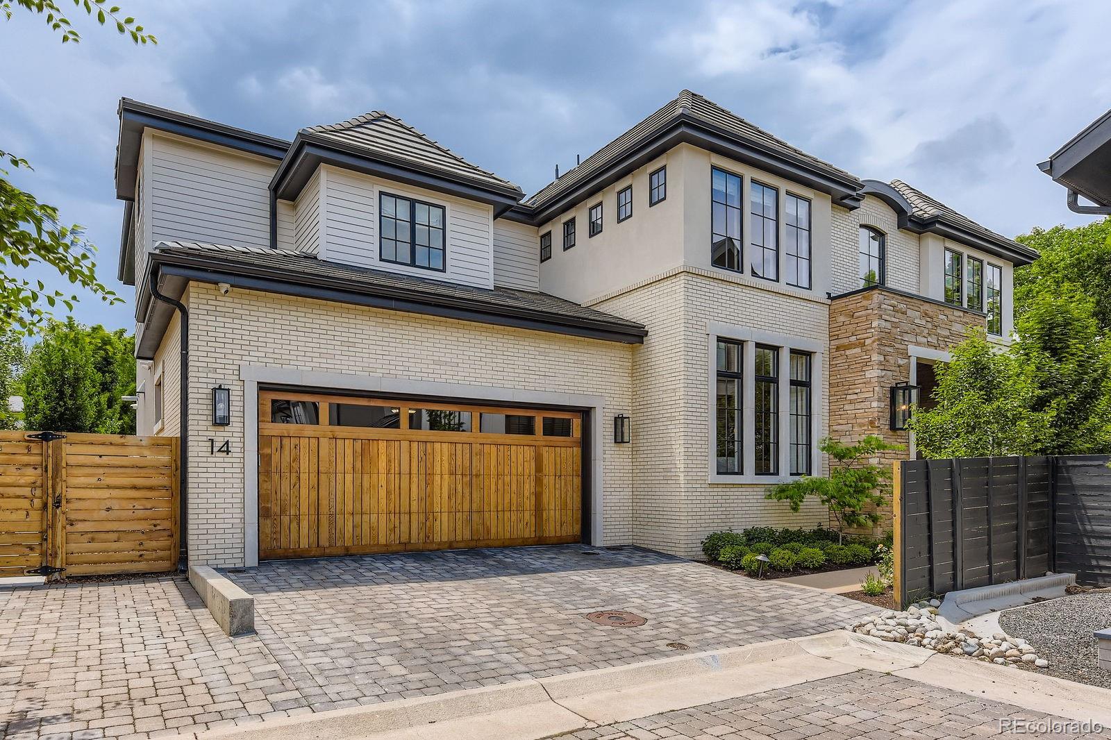 LOCATION, LOCATION, LOCATION! Welcome to the exclusive, gated Cedar Lane community, just a short walk from the premier shops & dining of Cherry Creek North w easy access to the Cherry Creek Trail. This 7-bedroom, 7-bath estate sits on a private, oversized corner lot, blending sophisticated design, cutting-edge technology, & over $900,000 in curated upgrades. Step in to the sun-drenched main floor to find soaring high ceilings & a wide open floor plan that seamlessly integrates w your outdoor resort style backyard. Create a meal in the amazing gourmet kitchen featuring high-end appliances, dual dishwashers, huge island w breakfast bar seating and slab marble counters w waterfall edges. Designed for both daily living & elevated entertaining, every detail of this amazing floorplan was meticulously designed for comfort, convenience & socializing. The home features a dedicated office, dual laundry rooms, sound system throughout, comprehensive security system w cameras surrounding the exterior & built-in sauna. All four beds up are en-suite, incl the luxurious primary suite, w steam shower, heated floors, large soaker tub & impressively sized dual walk-ins. The expansive basement space features a great room, wet bar, custom home theater w super high-end A/V & luxury seating included, guest suite & home gym. Outside you'll find your personal oasis: a saltwater swim motor pool & jacuzzi, outdoor fireplace, built-in BBQ & stovetop, pizza oven, outdoor TV/audio, & built-in patio heaters, perfect for year-round enjoyment. Large backyard offers unmatched privacy w plenty of space for relaxing w multiple seating areas, surrounded by mature trees & meticulously landscaped gardens. Optimized for pets, the home incls a built-in dog door & dog run, safely separated from pool area. Features*16kW solar system & 5 Tesla Powerwalls (paid for)*Whole-home air filtration/humidifier/water filtration*EV charging/3 cars*heated garage w epoxy floor & built-in storage*elevator to all levels*