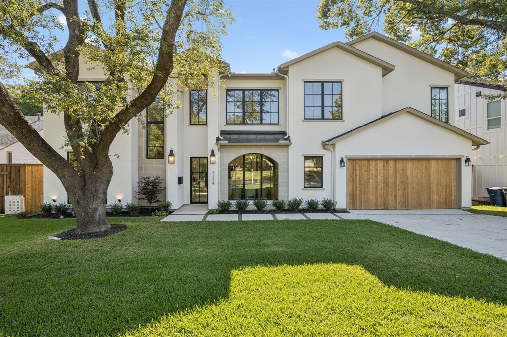 Refined luxury and timeless design define this stunning 5,005 sq. ft. Lakewood residence at 3124 Sperry Street. Thoughtfully designed for comfort and functionality, this home offers 5 bedrooms, 5 full baths, and 2 half baths, including a game room and dedicated pool bath. The open floor plan showcases exquisite craftsmanship with white oak flooring, smooth finish walls, and designer finishes throughout. A spacious family room with a sleek fireplace flows seamlessly to the outdoor living area through sliding glass doors, creating an effortless indoor-outdoor connection. The chef’s kitchen features Wolf and Sub-Zero appliances, honed Mont Blanc quartzite countertops, and a hidden walk-in pantry. The first-floor primary suite offers a spa-like bath, walk-in closet, and sliding doors that leads to the private backyard and pool, while a guest suite provides ideal flexibility. Upstairs, enjoy three en-suite bedrooms, a game room, and versatile flex space ideal for a study, media rooms or gym. Step outside to a resort-style backyard complete with a large outdoor patio featuring a pool bath, outdoor kitchen, and infinity edge pool—perfect for gatherings or quiet evenings at home.