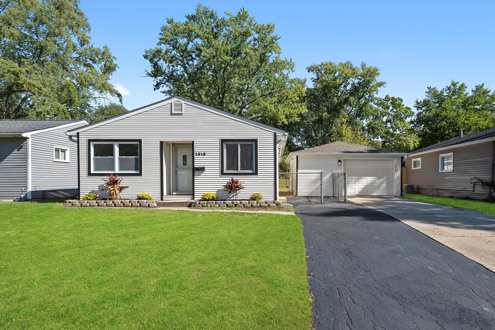 Beautifully updated 4-bedroom, 2-bath home in the heart of Glendale Heights! This move-in ready property features new luxury vinyl plank flooring in the bedrooms, updated living room windows, and fresh paint throughout. Enjoy the fully updated bathroom, including a private in-suite in the master bedroom. The spacious layout offers comfort and functionality with modern finishes, while the large fenced backyard is perfect for entertaining, kids, or pets. Plus, a detached 2-car garage and extended driveway provide ample parking for up to 5 cars. Conveniently located near parks, schools, and shopping-this home is ready for its new owner to enjoy!