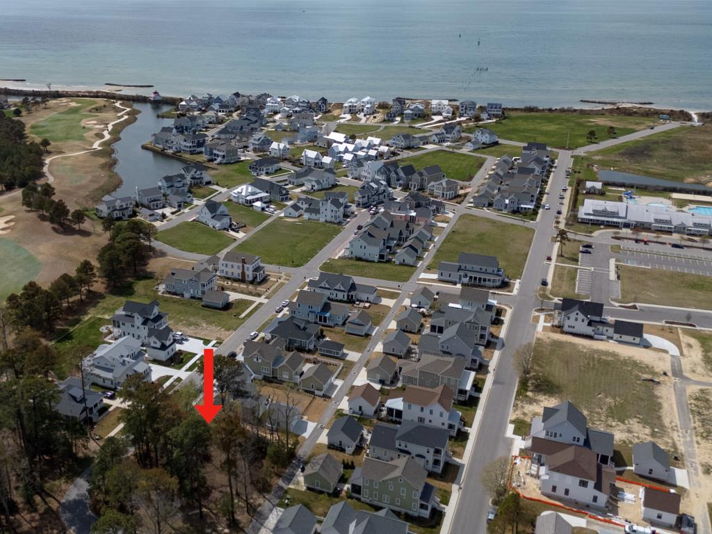 Gorgeous lot close to the beach in desirable Bayside Village in Bay Creek. An ideal location to build your dream home and enjoy the coastal lifestyle for which Bay Creek is famous! Sports membership or Golf membership required to embrace the menu of activities including the Life Center and its pools, sauna, gym, and work out classes, or add to that the golf package for exclusive access to the two private courses. Create the home of your dreams in Bay Creek - it is waiting for you.