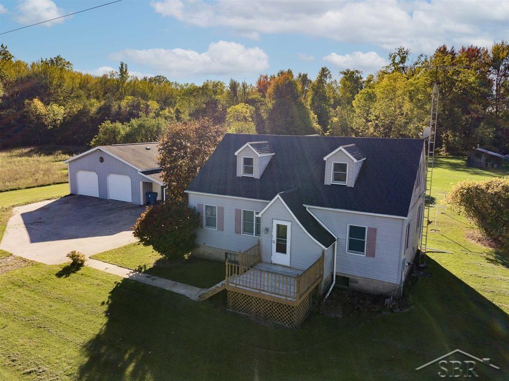 SO MUCH TO LOVE ON SEVEN MILE! Let's face it, there aren't many opportunities to own 99.10 acres these days, but here is your chance! Located in Pinconning just off I-75 and US-23 this property features a 1428 sqft home with 3 bedrooms and 2 full bathrooms. I love that there's a full bathroom on the 2nd floor, you don't often see that in an older farm-style home. There is a 36x48 pole barn that can handle 4 cars, or a couple cars and a lot of toys/tractor. The pole barn is insulated and has a back slider for access to the back of the pole barn. How about that 99 acres? It's a beautiful blend of hard and soft woods, with open areas and food-plots. It is teeming with wildlife and if you know anything about this area, you know that means lights out deer hunting. This could be your next deer camp (conveniently located just of the highway) or the place you decide to raise your family. Either choice is the right on and you'll be glad you did!