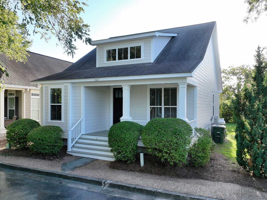 This impressive Norman Rockwell styled cottage has completely been remodeled with new paint inside and out, new laminate wood flooring throughout, new Stove, Dishwasher & Microwave vent hood and much more!  Impressive 2 story ceilings add the extra touch of class to this truly polished cottage in Popular Madison Grove.