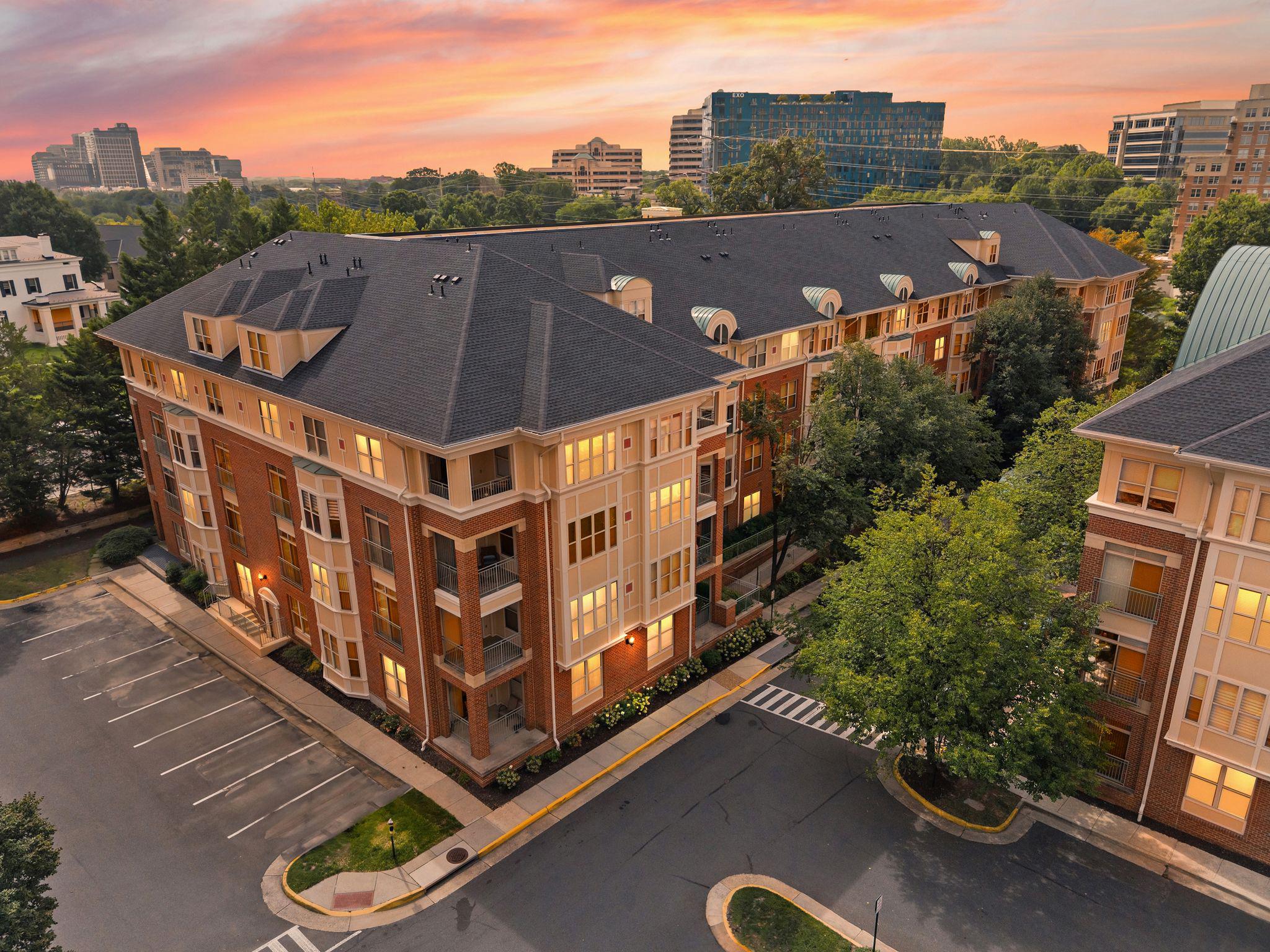 Welcome to easy Reston Town Center living at 1855 Stratford Park Place #107, a two bedroom, two full-bath condo! With hardwood floors, a private patio, garage parking, and two additional storage units, this home delivers an impressive combination of comfort, convenience, and location.The open living and dining spaces feature warm hardwood floors and flow easily to the patio, creating a wonderful spot to enjoy your morning coffee, unwind at the end of the day, or add a little outdoor living to your everyday routine. The kitchen features granite countertops and stainless steel appliances, while an in-unit washer and dryer keeps laundry conveniently at home.The primary suite offers its own full bath along with TWO spacious closets, providing the kind of storage that's always welcome in condo living. A second bedroom and full bath add flexibility for guests, a home office, roommate, or whatever best fits your lifestyle. The HVAC was also updated in 2021.And there's even more storage outside the condo! A dedicated garage parking space plus TWO storage units give you additional room for bikes, luggage, seasonal décor, and all the extras you don't want taking up space at home.Enjoy fabulous restaurants, shopping, entertainment, and events just moments from your front door. With Metro access and major commuter routes nearby, you can spend less time getting where you're going and more time enjoying everything Reston has to offer.  Easy access to Route 7, Fairfax County Parkway, the Dulles Toll Road, Dulles Airport, and the Metro Station (less than 2 miles!), as well as nearby access to the W&O trail.Schedule your tour today and claim this home for yourself!