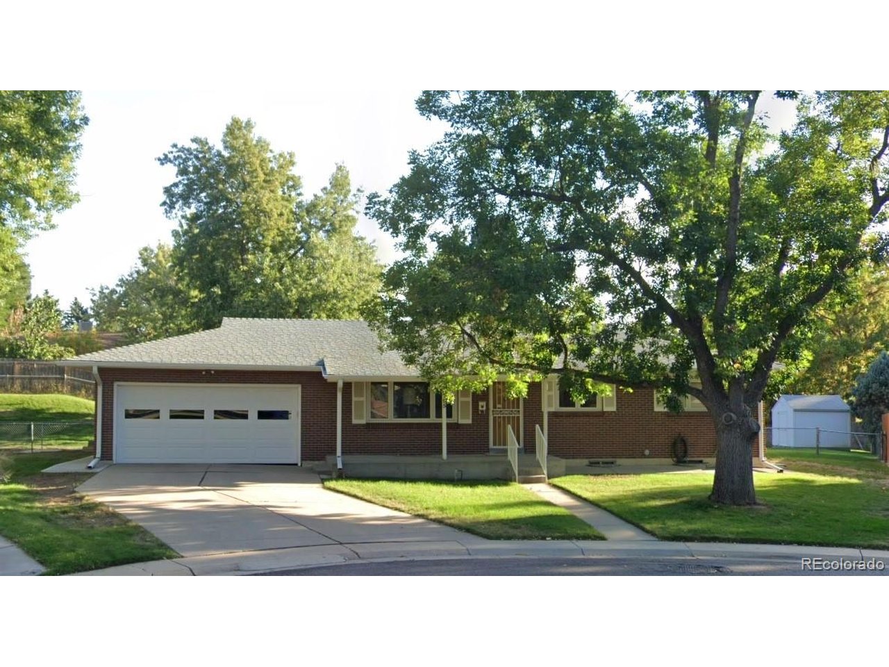 **Professional photos will be uploaded Tuesday 7/14** Tucked away on a quiet cul-de-sac in Hutchinson Hills, this classic brick ranch is the kind of home that's becoming harder to find-a solid home with great bones, a generous floor plan, and the opportunity to make it your own over time. With five conforming bedrooms, three bathrooms, and over 2,100 finished square feet, there's room to grow, gather, and create a space that reflects your style.Original hardwood floors bring warmth and character to the main level, while the spacious kitchen offers plenty of room to cook, connect, and imagine what's next. The finished basement expands the home's flexibility with two additional conforming bedrooms, a 3/4 bathroom, and space for guests, hobbies, a home office, or movie nights.Perfectly livable as it is, this home gives you the chance to move in, settle in, and take on projects at your own pace instead of all at once. Whether you choose to refresh a room here and there or envision a complete transformation down the road, you'll have the flexibility to make it your own while enjoying everything the home already has to offer.Step outside to an oversized backyard with room to entertain, garden, play, or simply relax. The attached two-car garage and quiet cul-de-sac location add to the home's everyday appeal.Offered as-is, this is an opportunity to put your personal touch on a well-cared-for home in one of southeast Denver's established neighborhoods. Bring your vision, build equity, and make this Hutchinson Hills ranch your own.
