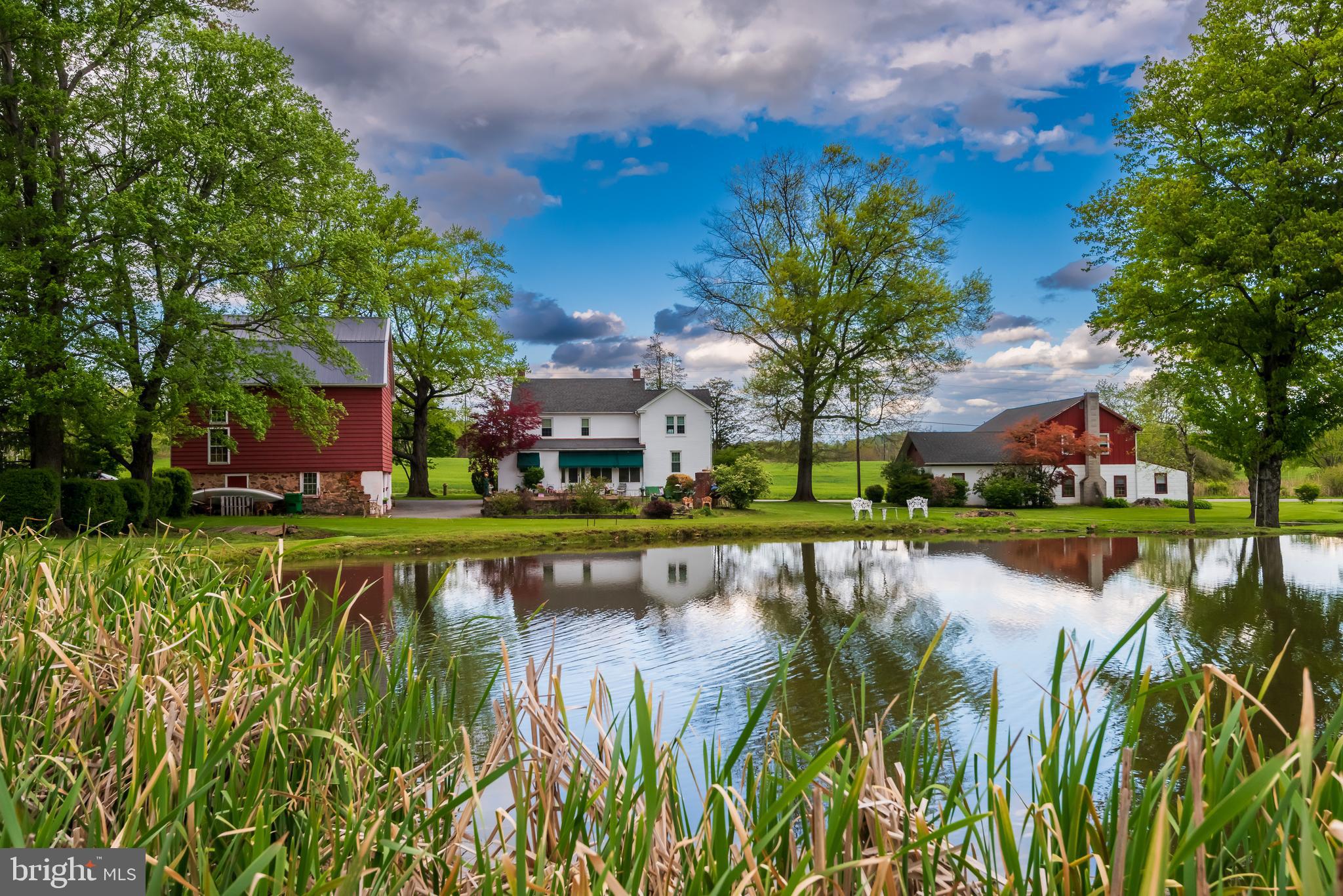 This incredible Family Estate is being offered for sale for the first time in over 50 years! So many generational family memories are found within the wall of this amazing property which offers a Farmhouse dating back to the 1800's plus a barn, separate stable, and huge 5 stall garage with two additional floors above the garage!  There are two separate living spaces within the property offering at least 6 bedrooms with the ability to add more.  Currently zoned commercial and used as an Antique Business.  The showrooms can be reconfigured to suit your needs. The estate includes two ponds, an in-ground pool with a separate cabana, and scenic views across 8+ acres. Sellers require a minimum five-month settlement. Property is sold as-is; inspections are for informational purposes only. All showings are by appointment through the listing agent. Commercial-use inquiries should be directed to the Colebrookdale Township (Berks County) zoning department.