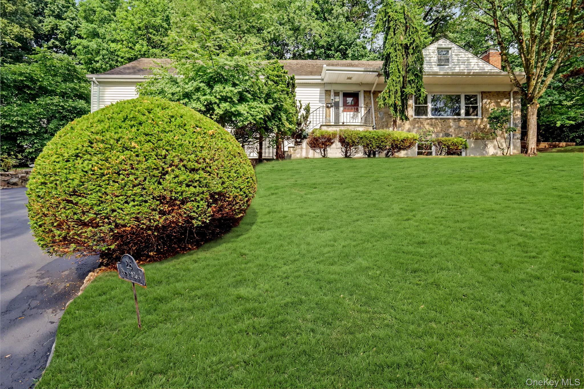 Easy one-level living in this Edgemont home located just a short walk from Hartsdale Village with shopping, restaurants and the Metro-North express train to New York City! Tucked away on a tranquil street behind the Scarsdale Golf Club, this Ranch style home offers four bedrooms, three full baths and a Chef's Kitchen ideal for hosting the holidays or entertaining friends. An open floor plan, picturesque views and privacy are key features. The large lower level provides flexible space for play, hobbies or working from home. There is also an enormous walk-up attic that provides opportunity to add an additional and significant amount of living space to this fantastic home. Close to Edgemont Junior/Senior High School with Private bus to Seely Place Elementary. Walk to express Metro North train to New York City in the Award Winning Edgemont School District. Close in time for school this Fall!