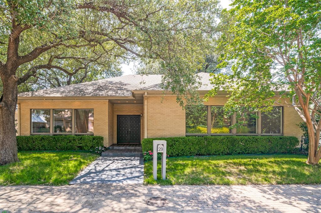 ONE STORY soft contemporary, MCM Style home in a charming pocket enclave of only 31 homes located in a prime zero lot line community at Royal Lane and the Tollway with extremely reasonable HOA dues that include tennis, pool and clubhouse. This home features tall ceilings with oversize windows in most rooms for tons of natural light. The expansive living room with a wall of built-ins flanking the fireplace adjoins a second living space with additional built-ins and access to one of several patios. This second living area was customized as a study for the homeowner and could be converted back to a third bedroom as it was originally. The formal dining room is designed for entertaining with a well equipped butler’s pantry that transitions to the kitchen. The original kitchen is just waiting to be brought back to life and achieve it’s full potential. The bones are there to turn possible to perfection. The primary suite is fabulous with a huge bedroom with fireplace, built-ins and patio access PLUS a master bath-dressing room with two huge WIC. Great built-ins throughout the house plus an oversize garage. Beautifully maintained community!!  NO CAST IRON-ALL SEWER LINE PIPES ARE PVC!! ALL 3 AC UNITS REPLACED, JUNE 2025.