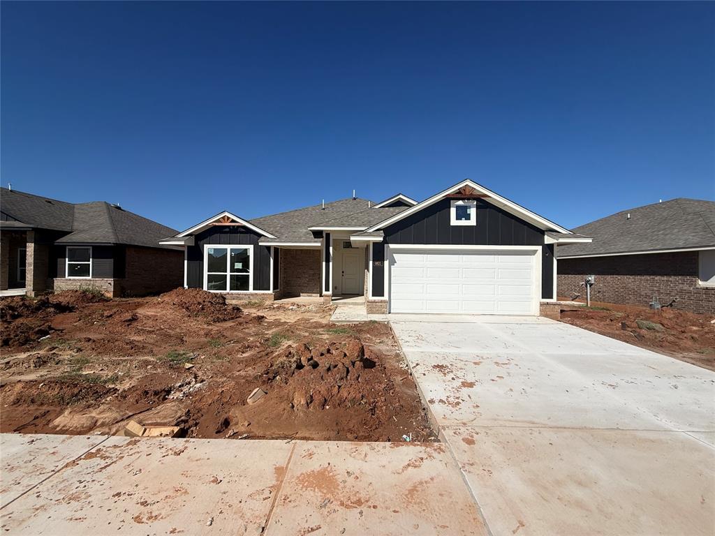 This new construction three-bedroom, two-bath home offers a functional open floor plan designed for modern living. The living area features a fireplace and connects to the dining and kitchen spaces for everyday use and gatherings. The kitchen includes quartz countertops, Samsung appliances, soft-close cabinetry, and a breakfast bar. The primary suite features a bathroom with a soaking tub, tiled shower, and walk-in closets. Additional bedrooms are well-sized within the layout. Currently under construction, this home offers modern finishes and efficient design.