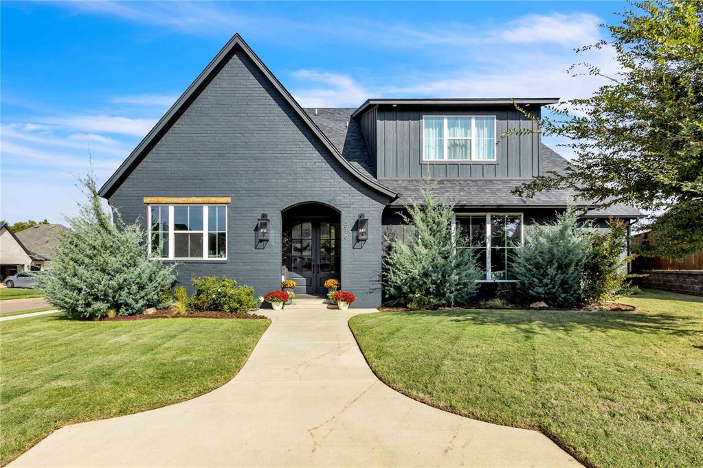 Stunning home on corner-lot designed for living & entertaining! From the moment you step through the true entryway, you'll be impressed by the elegant design and thoughtful layout. The modern staircase with wrought iron railing sets the tone, leading you into the bright and open main living space. The living room features a cozy gas fireplace, an abundance of natural light, engineered wood floors, and electric shades. The open-concept layout flows seamlessly into the dining area and chef-inspired kitchen—perfect for both everyday living and entertaining. The kitchen includes bar seating, a walk-in pantry plus an additional overflow pantry, ice maker, and extensive counter and cabinet space for all your culinary needs. Enjoy seamless indoor-outdoor living with both a side patio and a backyard patio connected directly to the main living areas—ideal for hosting gatherings or enjoying quiet mornings. The side patio, accessed through beautiful double doors, expands your living space and brings the outdoors in. The spacious primary suite is located on the main floor and includes large windows, an accent wall, and engineered wood flooring. The luxurious en-suite bathroom features a freestanding soaking tub, a gorgeous tiled shower, double vanities, and a generous walk-in closet. Also on the main floor, you'll find a secondary bedroom or study with built-in desk—perfect for remote work or homework—as well as a full guest bathroom. Upstairs, two oversized bedrooms and a full bath providing plenty of space.
Designer finishes, custom tile work, wallpaper accents, and modern color palettes elevate the entire home with warmth and character. Neighborhood amenities: walking trails, pool, gym/clubhouse, basketball court, park and more. Don’t miss this opportunity to own a beautifully crafted. Come experience the quality and style of Alder Fine Homes today!