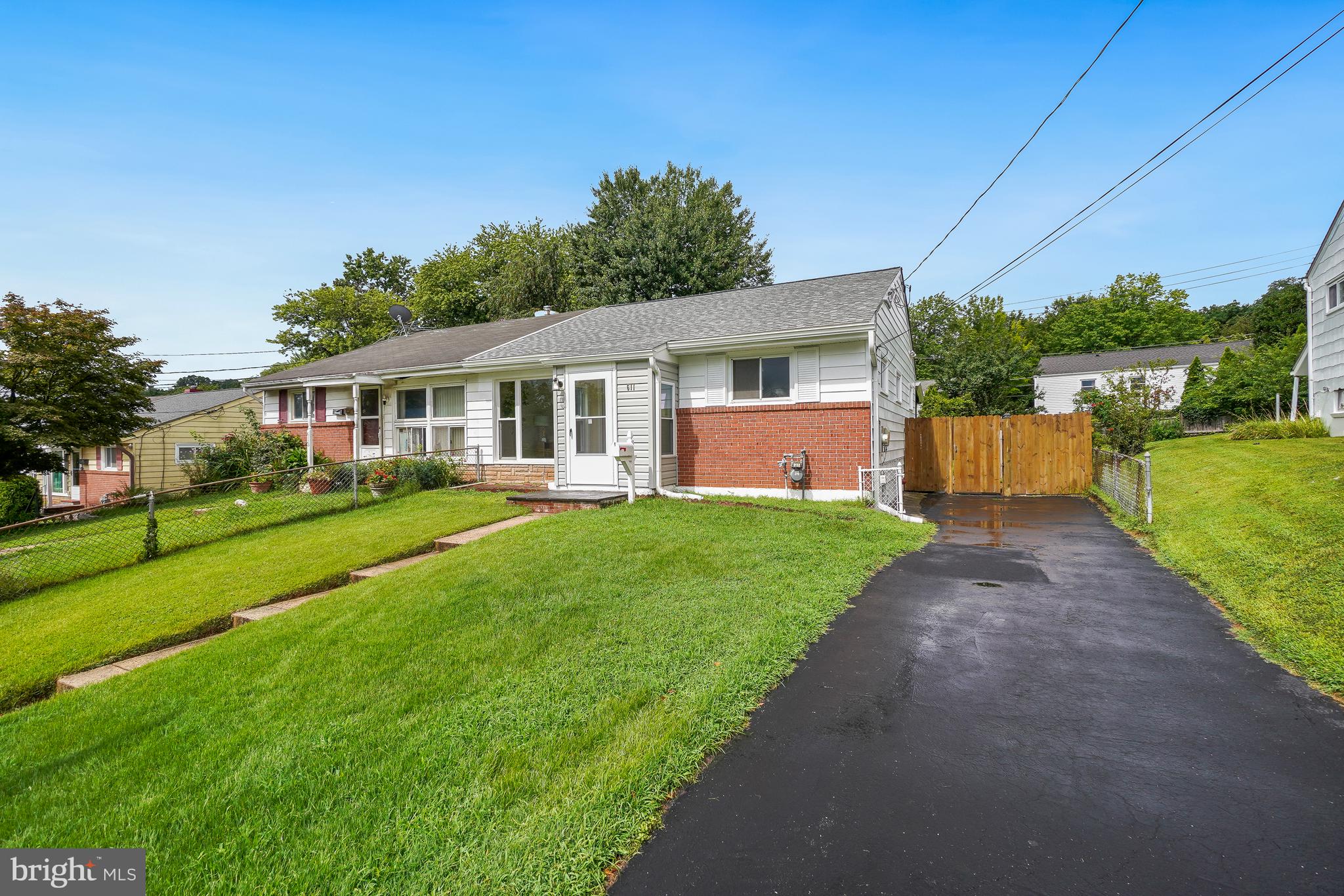 Welcome to this beautifully updated and expanded home in the desirable Lynfield neighborhood of Rockville. Thoughtfully renovated with newly installed laminate flooring on both the main and lower levels, this move-in-ready home offers spacious living areas, flexible floor plan options, and numerous recent improvements designed for today’s lifestyle. The sun-filled main level features a generous living room, three well-sized bedrooms, a full bath, and an updated kitchen that flows effortlessly into the bright dining area—creating an inviting space for both everyday living and entertaining. Just off the dining room, a private patio and backyard provide the perfect setting for outdoor dining, weekend gatherings. The fully renovated lower level, completed in 2021, greatly expands the home’s living space with a large living room, a full bathroom, and a wet bar, making it ideal for entertaining or multi-generational living. The adjacent laundry area includes a brand-new washer and dryer installed in 2025. Two additional bonus rooms offer endless possibilities for a home office, exercise room, guest suite, playroom, or hobby space. Over the years, the home has been carefully maintained and enhanced with quality upgrades, including a remodeled kitchen and new front porch in 2020, an upgraded electrical panel and finished lower level in 2021, a Landmark Pro roof with 50-year protection installed in 2023, and a new refrigerator and gas range added in 2026. Additional highlights include a new screen door, resurfaced three-car driveway, storage shed, and a spacious walk-up attic that provides abundant storage. Conveniently located just minutes from downtown Rockville, the Metro Red Line, parks, shopping, and dining, this home also offers easy access to I-270 for a seamless commute to Washington, D.C. Combining comfort, versatility, and an unbeatable location, this is a home you won’t want to miss.