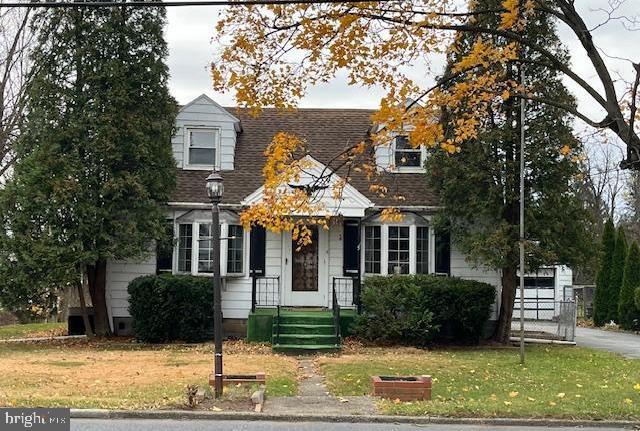 Charm of this mid-century Cape Cod awaiting some DIY projects.  Features include light filled gathering room with focal fireplace, centrally located spacious dining room adjoining an efficient eat-in kitchen, main level bedroom or perfect for remote worker, telecommuter or home-based.  A bonus is the south facing sunroom to the rear for plants, people or pets to warm on sunny days.  Quiet areas in upper level have two generous sized bedrooms with dormers for a desk or book nook, plenty of closet space and a full tiled bath with storage.  Lower level partially finished and has a second kitchen area for the baker or hub of perhaps the family holiday or celebration hosting.  Full bath with custom shower for people or pets. Laundry hookups complete the lower level.  Warm hot water oil heat, central air system and 200 amp service. Although the inground pool has not been opened for years, the rear yard could again be the stay-cation for family and friends.  Plenty of area for the urban gardener, current or potential green thumbs. Detached garage for hobbyist, toys or auto.  This Linglestown home is looking to shelter and welcome new folks to the neighborhood, tucked a few streets away from the merchants on Rt. 22 (Allentown Blvd-Jonestown Rd) to meet the needs of any lifestyle.  Easy travel access to work, worship, medical and dining plus the cultural and sporting events of the capital city region.