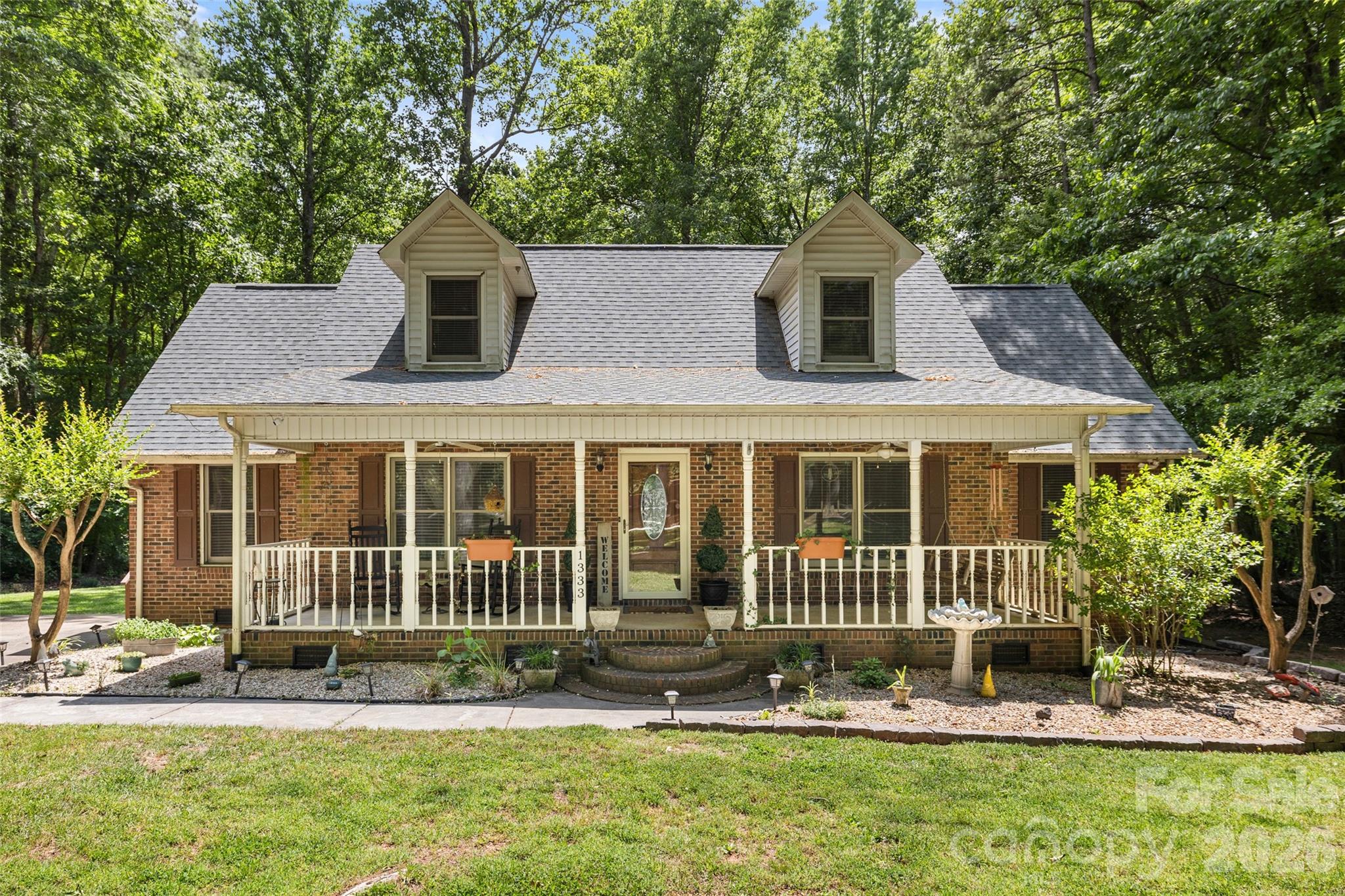 Welcome home to this lovely move-in ready home on over an acre just outside of historic downtown York with no HOA! This cape cod style home offers a very liveable floorplan. The primary suite on main features large glass shower, dual vanities, plenty of closet space. Two bedrooms share jack and Jill with separated vanity areas. Large living area with fireplace open to kitchen and dining area. Office/flex plus laundry and half bath. Rocking chair front porch plus huge backyard deck perfect for relaxing and entertaining. Detached garage offers three bays plus a finished room. Roof new 2024. Heat Pump new 2023. Nearby downtown York offers unique and convenient shopping, dining, and frequent community events and festivals. Make your appointment to see this one today!