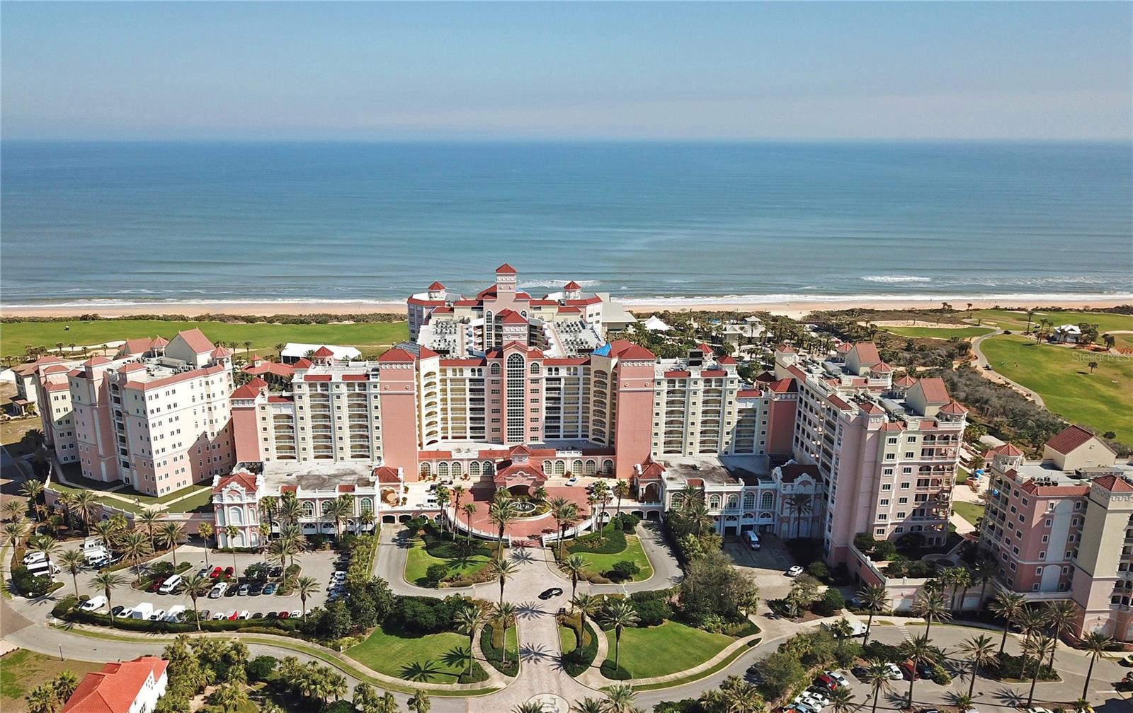 FREE TRANSFER OF THE BEACH LEVEL MEMBERSHIP.  Take the tour to visit and discover the coastal lifestyle awaiting you with this direct ocean view 3-bed/3-bath condominium on the 8th floor of the spectacular Hammock Beach Club and Resort. The condo is offered fully furnished and rental-ready, providing exceptional flexibility for your needs. This spacious layout gives generous privacy for guests and family time with living room and kitchen deigned to entertain and invite all to hang out. The patio and giant picture window have wonderful views of the ocean and Jack Nicklaus signature ocean course 18th hole. The master en-suite bedroom has private patio access with a large slider for great views. Recent improvements include all-new impact windows and sliding glass doors, 2026 microwave, and a 2019 AC system. Club Ownership offers the opportunity to enjoy a ton of amenities through the included membership to The Club at Hammock Beach: another signature designed golf course by Tom Watson, tennis and pickleball courts, multiple pools, a lazy river and waterslide at the Pool Pavilion, and a well-outfitted workout center on-site (one at Conservatory and at Yacht Harbor locations), and full-service spa. There are also a number of dining options on-site. Come experience this for yourself—schedule your private tour today!