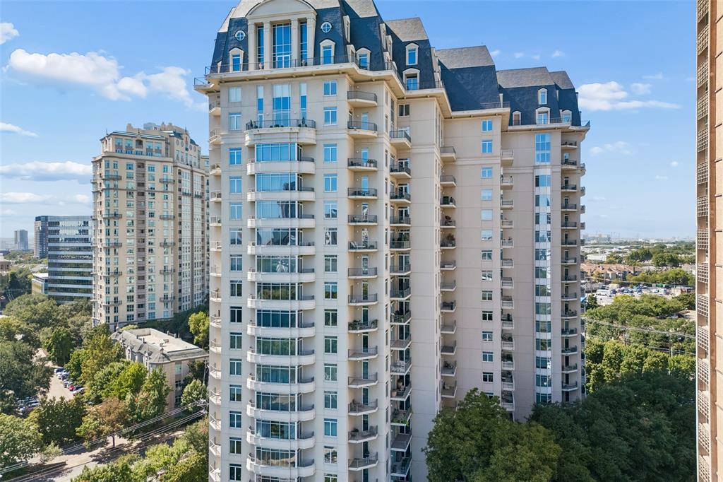 Rare opportunity to own an exquisite residence at The Vendome, where luxury meets modern elegance.  The Vendome Unit 5A is the highly sought-after floor plan overlooking the lush greenery of beautiful Turtle Creek and breathtaking views of vibrant Downtown Dallas.  Restricted private elevator access opens directly into your private residence in which you are greeted by a grand floor plan that seamlessly blends sophistication with comfort. The residence features three spacious bedrooms, each complemented by a luxurious ensuite bathroom, ensuring privacy and comfort for all occupants. In addition, a well-appointed half-bath serves your guests.  The heart of the home is the gourmet kitchen, which boasts top-of-the-line appliances connecting to a sunlit breakfast area, perfect for casual dining. Expansive floor-to-ceiling windows flood the space with natural light and open onto multiple terraces, offering panoramic views in three directions.  The elegant primary suite is a haven of tranquility, featuring dual marble spa-inspired baths, custom walk-in closets, and access to two multiple balconies—ideal for unwinding with a serene outlook.  This residence also includes a formal living room with a cozy gas stone fireplace, a library for quiet retreats, and a formal dining room connected by a gallery-style hallway. Additional features include two wet bars with wine coolers and ample storage solutions.  Three parking spaces (232, 233, and 308) and storage unit (S59) convey with the Sale. HOA monthly dues include all utilities except internet and cable. The Vendome owners enjoy 24-7 valet and concierge services, 24-7 security, doorman, Community Room with terrace and catering kitchen, an owner's living room, business center, three guest suites, state-of-the-art fitness center, amazing resort-style heated pool, outdoor kitchen and BBQ, spa and cabanas, a dog park, library and more. Walking distance to the Katy Trail, shopping, and outstanding local restaurants.