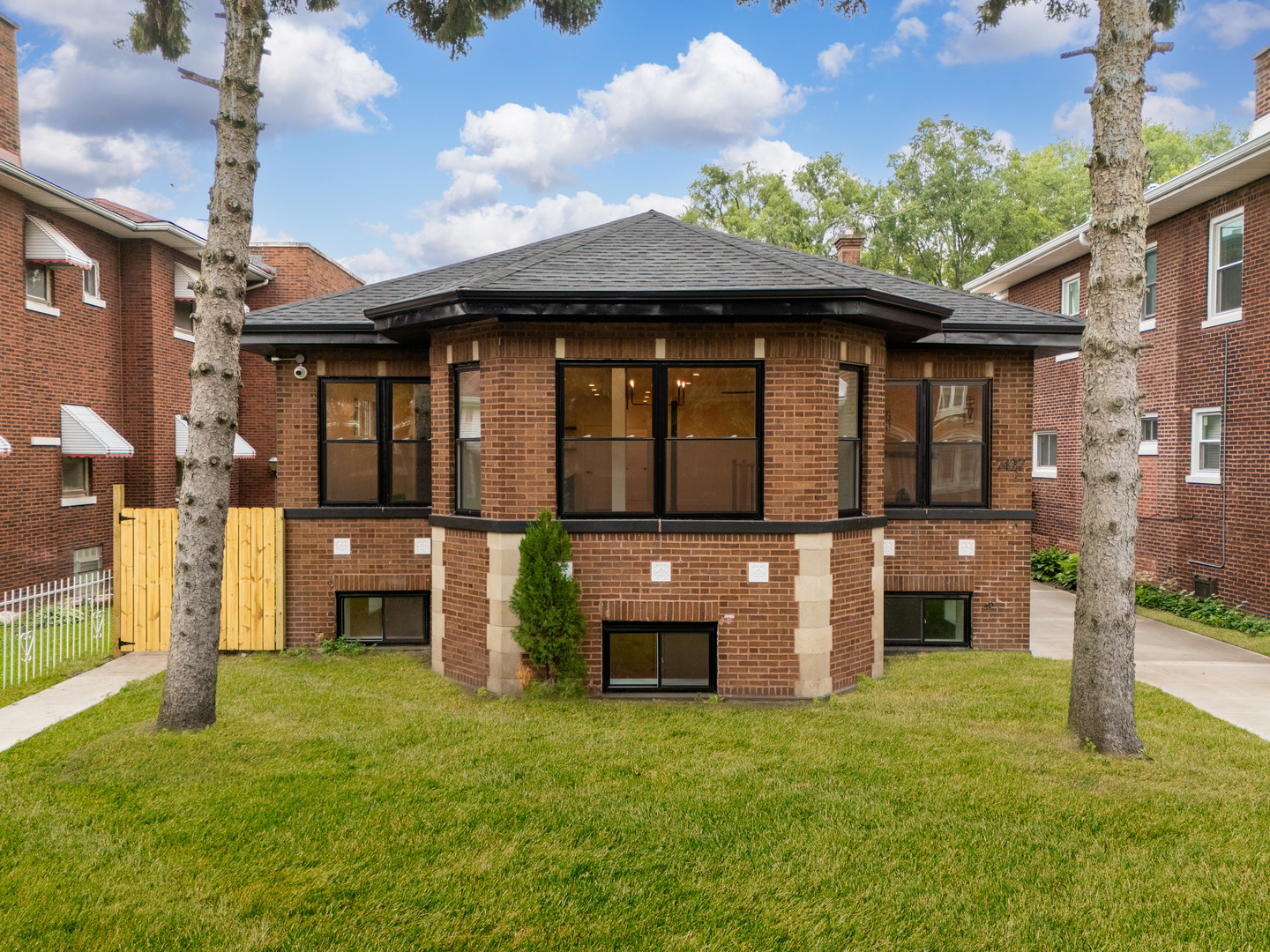 Welcome To Your DREAM HOME In South Shore!!!  This Stunning, Fully Renovated 6-Bedroom, 4-Bathroom Bungalow Offers 2,580 Sq Ft Of Beautifully Re-imagined Living Space Plus Nearly 2,000 Sq Ft Of Finished Basement Space! As Soon As You Walk In, You'll Feel The WOW Factor, An Open-Concept Design Filled With Natural Light, Sleek Finishes, And Modern Touches Throughout. The Designer Kitchen Features Soft-Close Cabinetry, Quartz Countertops, A Custom Wood Vent Hood, Floating Shelves, Marble Backsplash, And New Stainless-Steel Appliances. Every Inch Of This Home Has Been Upgraded From Top To Bottom: New Roof, Plumbing, Electrical System With 200-Amp Service, Dual HVAC With Central Air And Furnace, Flooring, Windows, Concrete Pavement, Security System, And Much More! Located Just Minutes From The Lakefront, Jackson Park, South Shore Cultural Center, And The Future Obama Presidential Center, This Home Perfectly Combines Modern Luxury, Open Living, And Unbeatable Value.