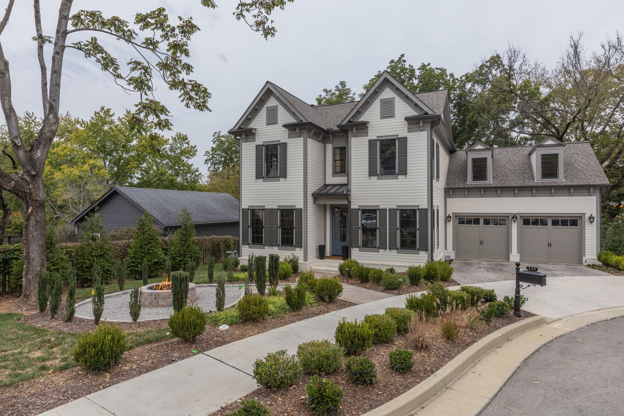 Lovely custom home with classic architectural design and modern interiors, 4 beds (primary on main), 4 double vanity full baths,(2 ensuite) and half bath. Beautiful hardwood floors, 10 ft ceilings, gourmet kitchen with high end professional appliances, custom cabinetry, quartz countertops, rear covered porch, fire pit surrounded by beautiful hardscape and landscape.  Boutique neighborhood within in a cul-de-sac with "Historic Downtown Franklin at your door step."