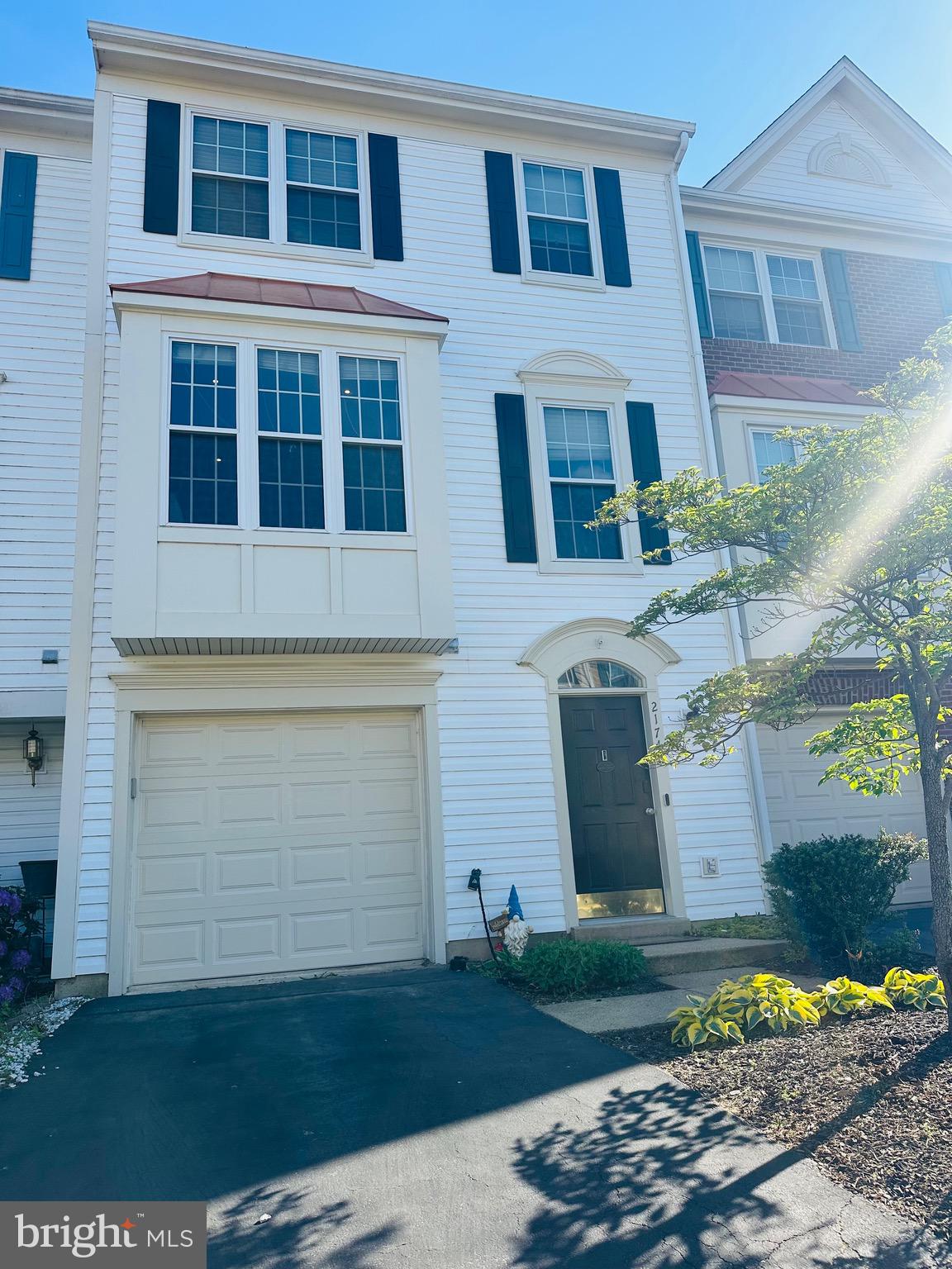 Beautifully maintained and move-in ready Carisbrooke townhome offering spacious living and tasteful updates in one of Ashburn’s most desirable communities. Bright interiors, abundant natural light, and thoughtful updates throughout make this home easy to enjoy from day one. Features include a recreation room with gas fireplace and walk-out access to the fenced backyard, light-filled living and dining areas, and an updated kitchen with painted cabinetry, updated countertops, stainless steel appliances, induction range/oven for fast cooking, and a breakfast nook. Upstairs, the primary suite includes double-door entry, a walk-in closet, and an updated bath with separate tub and shower, while two additional bedrooms and a second full bath complete the upper level.Outdoor spaces are equally inviting with fresh sod, an expanded rear deck, and mature trees providing added privacy. Additional highlights include updated flooring, newer roof (2022), EV charging station (2022), hidden storage, and a front-entry garage. Parking is effortless with a private driveway, garage, and an additional assigned parking space.Residents of Carisbrooke enjoy outstanding amenities including a pool, clubhouse, tennis and basketball courts, playgrounds, walking trails, and convenient access to shopping, dining, Metro access, major commuter routes, and the international airport. Offering comfort, convenience, and move-in ready appeal, this is an exceptional opportunity to own in an established, amenity-rich Ashburn community.OPEN HOUSESat, May 16 11:00 AM - 1:00 PMSun, May 17 12:00 PM - 2:00 PM