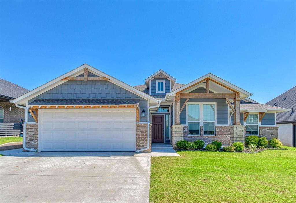 Stunning Craftsman style 3-bedroom home in the West Moore community of Native Plains! Come on into an open living/dining/kitchen space that is great for entertaining and comes with a cozy corner fireplace and lots of natural light from the numerous windows. The kitchen boasts quartz counters and island, built-in stainless appliances with gas range, and tile backsplashes! Retreat to the primary suite where you'll find a large walk-in closet, double vanities, soaking tub, and tiled walk-in shower! For outdoor enjoyment, you have a nice-sized covered porch for sitting and socializing, or a covered back patio for grilling out and relaxing! The extra concrete pad down the garage side of the home is convenient for hiding those pesky trash bins from street view! Neighborhood amenities include walking trails, ponds, and a playground. Owner licensed.