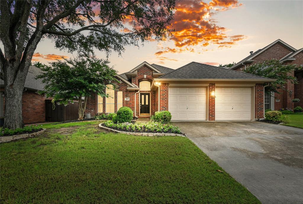 STUNNING SINGLE-STORY IN THE POPULAR WELLINGTON OF FLOWER MOUND! You will feel right at home in this open-concept floor plan graced with extensive wood flooring, crown molding, LED lighting, a cozy fireplace, a built-in planning center & a split bedroom layout. The chef in your family will love the modern kitchen boasting white cabinets, stainless steel appliances, a fridge, an island & a pantry. Tucked away at the back of the home, the secluded primary suite offers a peaceful retreat with a bay window sitting area, dual sink vanity, jetted tub, separate shower & a walk-in closet. Step outside to the private backyard, where you’ll find a large patio & plenty of space to relax, play, or host gatherings. Other features include a whole home surge protector & solar screens, plus a recently replaced oven, microwave, dishwasher, garbage disposal, garage door openers & primary bathroom toilet. Located in a highly sought-after neighborhood known for its outstanding amenities, including pools, playgrounds, tennis courts, pickleball, volleyball, basketball, a 3-hole putting green, 9-hole disc golf, a fitness center, lakes & miles of trails, this home also feeds into top-rated schools. Take a first-person look at this gorgeous home! Click the Virtual Tour link to see the 3D Tour!