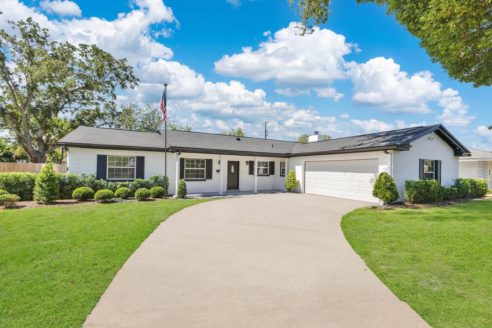 Stunning home in Maitland's English Estates neighborhood! PRE-INSPECTED - MOVE IN READY - HOME WARRANTY INCLUDED!!! Completely remodeled by Maru Design Studio, this beautiful 3-bedroom, 2 bath home features an open layout with high-end designer finishes throughout. Luxury vinyl plank flooring has been installed in every room of the home to create seamless transitions into each living space. The kitchen is absolutely gorgeous and features custom solid wood cabinetry, an island, brand-new stainless-steel appliances, and bright white Quartz countertops. A large living/dining room with decorative fireplace is adjacent to the kitchen and there’s a lovely multi-purpose room with built-in floor to ceiling shelving just off the foyer with French doors that open to the screened patio. Down the hall are two comfortably sized bedrooms and a gorgeous hall bath with a double sink vanity and optimum storage. The primary bedroom is spacious with a large walk-in closet and private en suite with shower. Each bathroom has been completely redone and include all new tile work, vanities, brass plumbing fixtures, new tub (hall bath), new toilets, and mirrors. Interior mudroom/laundry room off the 2-car garage has a new utility sink and room for additional storage. The backyard is a true oasis perfect for cookouts with family and friends or relaxing by the fire pit. New landscaping, including fresh sod and flowered garden beds complement the private backyard which showcases an array of pineapples, banana trees, and citrus trees. A large gazebo houses an all-new outdoor grill and is adorned with market lights and ceiling fan to keep you cool during the summer months. Other notable improvements include all new windows (2025), new roof (2021), new electrical panel (2021), water heater (2017), and copper plumbing. Located in the desirable English Estates neighborhood, residents enjoy quiet, walkable streets, close proximity to Kewannee Park with its waterfront boardwalk, playground, and wooded trails, and close proximity to major roadways, shops and dining. Homes in this neighborhood are zoned for English Estates Elementary, South Seminole Middle School, and Lake Howell High.