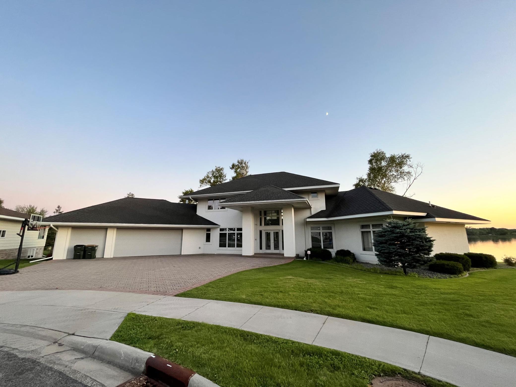 Check this out! An Executive 3 bed, 3 bath Sauk Lake home with a triple attached & heated garage! This custom built 2 story is located on a nice level lot with over 225' of lakeshore. Some main features are the granite counters, tile & bamboo floors, walk-in closets, large southern facing windows, spacious rooms, a Jenn-Air gas stove, surround sound audio, smart home controls for lights, temp & security, zoned in-floor heat, a steam shower & a jetted tub! You'll love the amazing views & sunsets on the lake from the decks & upper balcony! (Buyer's agent to verify all measurements/info.)