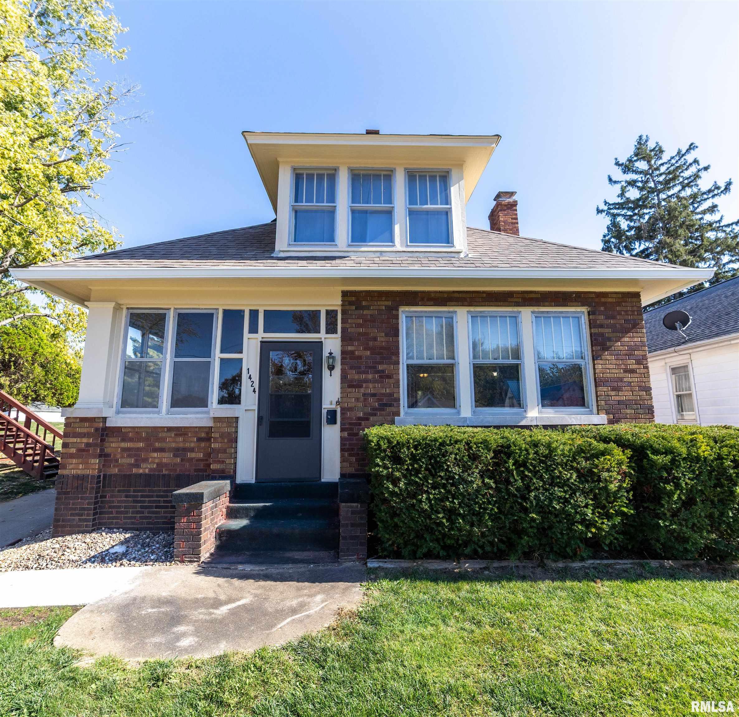 Large, beautifully maintained brick bungalow offering 4 (could be 6) bedrooms, 3 full baths and an impressive amount of flexible living space! Character can be found throughout with original woodwork and hardwood flooring under the main-floor carpet, numerous built-ins, a formal dining room and breakfast nook. The second floor provides multiple options for a den, office, study or additional bedrooms a full bath, a second laundry room and access to a balcony added in 2016. The finished walkout basement, with kitchenette, greatly expands the possibilities with a large family room, kitchenette, additional flexible living areas and a non-conforming room that could provide potential use as a 6th bedroom, guest space, hobby room or home office making it a great space for multi-generational living. Enjoy the screened porch, partially fenced backyard and an awesome tree house that adds even more personality to this property. Additional features include dual-zone HVAC, a tankless water heater added in 2016 and exterior painting completed in 2026. With 4 bedrooms, 3 baths, a finished walkout basement and versatile spaces throughout, this brick bungalow offers room to adapt to a variety of needs.