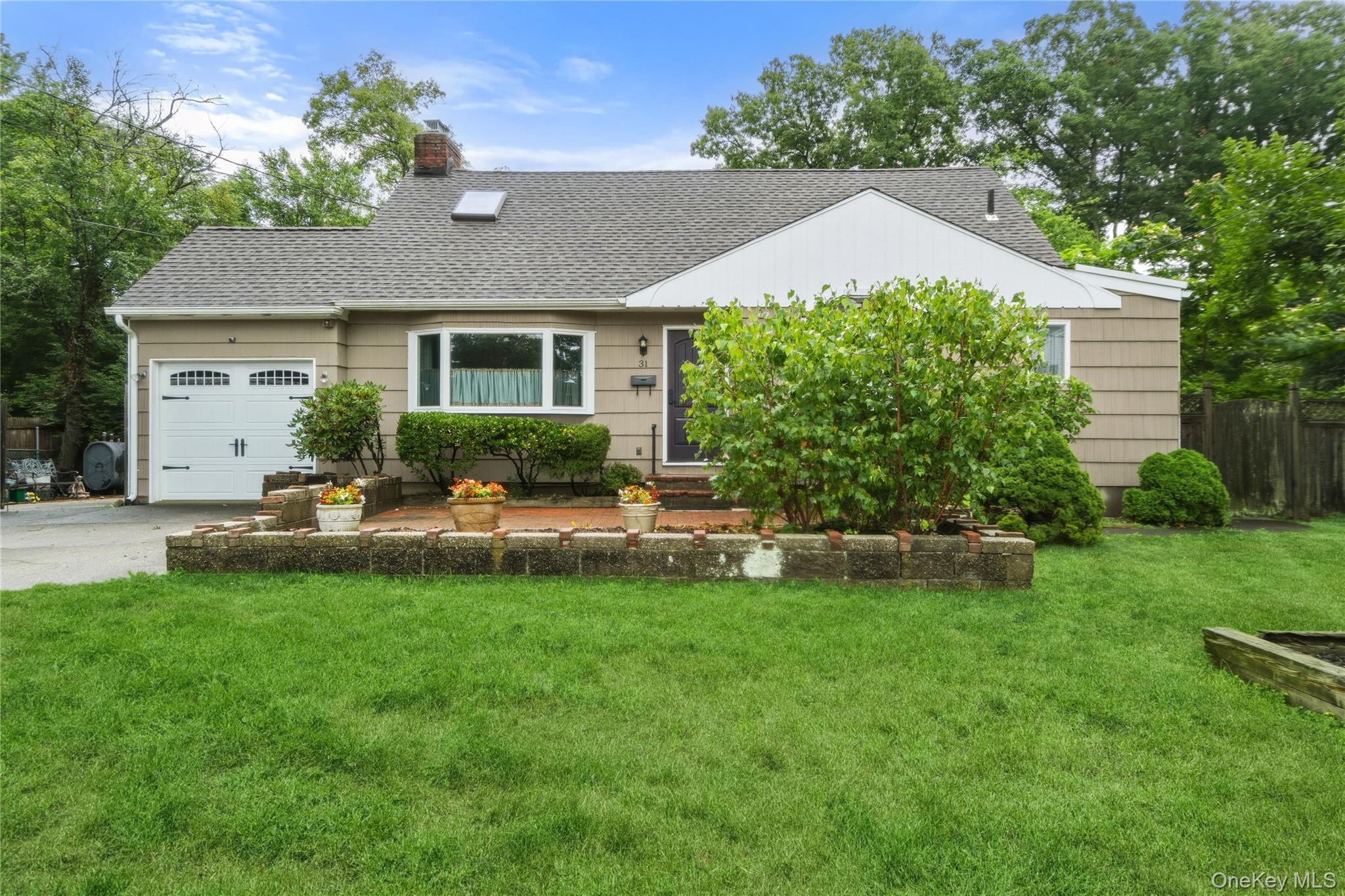 Lovely Expanded Cape with 2,209 Square Feet on a Private and Treed 90' x 158' Fenced Parcel. Enter into Living Room with Oak Floor & Brick Woodburning Fireplace with Fieldstone Surround into the Open Floor Plan Den with Wall Air Conditioner & Double Sliding French Doors to Backyard Deck into the Renovated Kitchen with Radiant Heated Porcelain Tile Floor, Custom Maple Cabinets, Granite Countertops, Tiled Backsplash, 36" Electric Stovetop with Hood, Double Oven, Dishwasher and Breakfast Bar with 2nd Sink. Formal Dining Room with Radiant Heated Porcelain Tiled Floor. Full Bath with Radiant Heated Porcelain Tiled Floor with Tub. Walk-In Pantry Closet. Additional Room Behind 6' of Garage Storage with Heat and  Closet for 4th Bedroom-Playroom-Gym-Office. 2nd Floor Features Primary Bedroom with Skylight, Ceiling Fan with Light, Walk-In Closet, Oak Floor & Access into Full Bath with Double Vanity Sink, Tub & Separate Thermostat for Heated Towel Bar that Opens into Hallway &  Two More Bedrooms with Carpeting &  Double Closets. Full, Partially Finished & Heated Basement with Separate Thermostat, Laundry Room with Washer & Dryer,  Full Bath with Shower and Outside Entrance into Backyard. Oil Hot Water Baseboard Heat Above Ground Oil Tank with 4 Thermostats, 2 Wall Air Conditioners, 10-Year Old Architectural Timberline Roof, 200 Amp Electric Service, Anderson Windows, Whole-House Aqua-Pure Water Filter System, Inground Sprinklers, Organic Lawn and Gardens & Hi Hat Lighting Throughout. Conveniently Located Just South of Southern State Parkway, Short Distance to Babylon Village Shops & Restaurants & Walking Distance to Phelps Lane Memorial Park & Senior Center, Belmont Lake State Park and 2+/- Miles to Babylon Village LIRR Train Station.