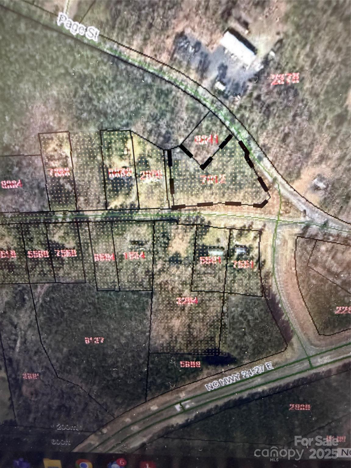 Build your dream home in the heart of Troy. This beautiful wooded 2.49 acre lot is located inside city limits, offering the perfect blend of peace and convenience. Walking distance to Montgomery Community College and Montgomery Central Highschool. Tap on fee required to hook to city water OR have a well installed. City sewer is available but a pump system will have to be installed and tap fee paid OR install septic system.