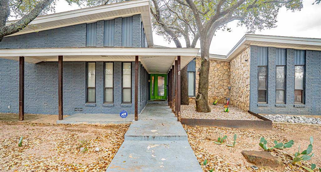 Discover a truly unique property in 76126, offering exceptional privacy and versatility. This home features an inground gunite swimming pool with ample space for outdoor entertaining. Surrounded by a dairy farm and Lake Benbrook, the setting provides unmatched seclusion.A standout second building includes an indoor gun range, a flexible studio or workshop space with multiple 12-foot roll-up doors, and a full apartment above it complete with a kitchen, living area, bedroom, and bathroom.The main home offers 5 bedrooms, including a private upper-level suite, two living areas one with direct pool access and a full bath, an updated kitchen with stainless steel appliances, and a three-car garage. The property has a proven rental history, offering excellent income potential.Endless possibilities live in the main home and rent the apartment, live in the apartment and rent the main home, or enjoy the entire property as a private compound. Opportunities like this are rare. Don’t miss it!